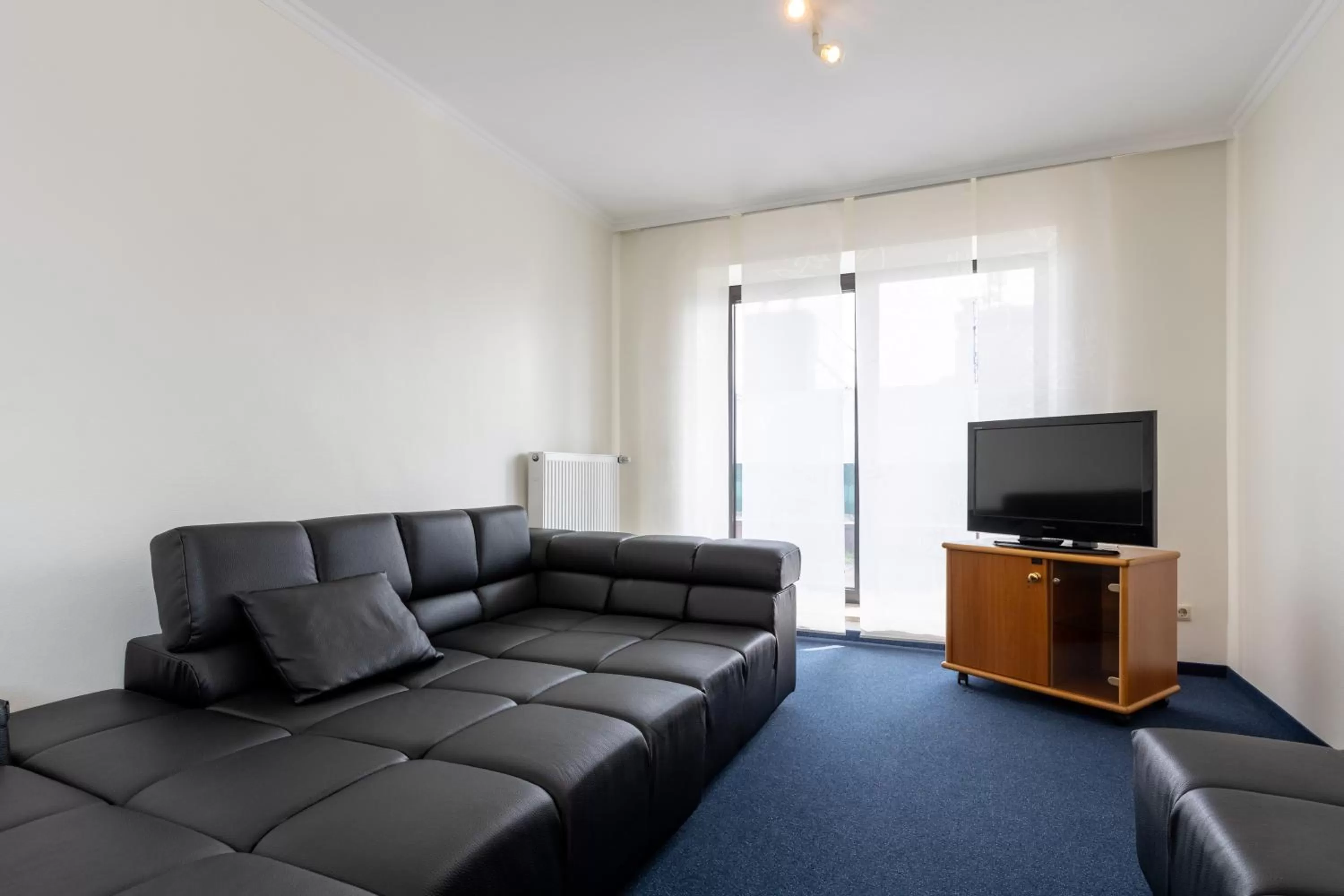 Living room in Fly Inn Hotel Frankfurt Airport Rüsselsheim ehemals Trip Inn Hotels