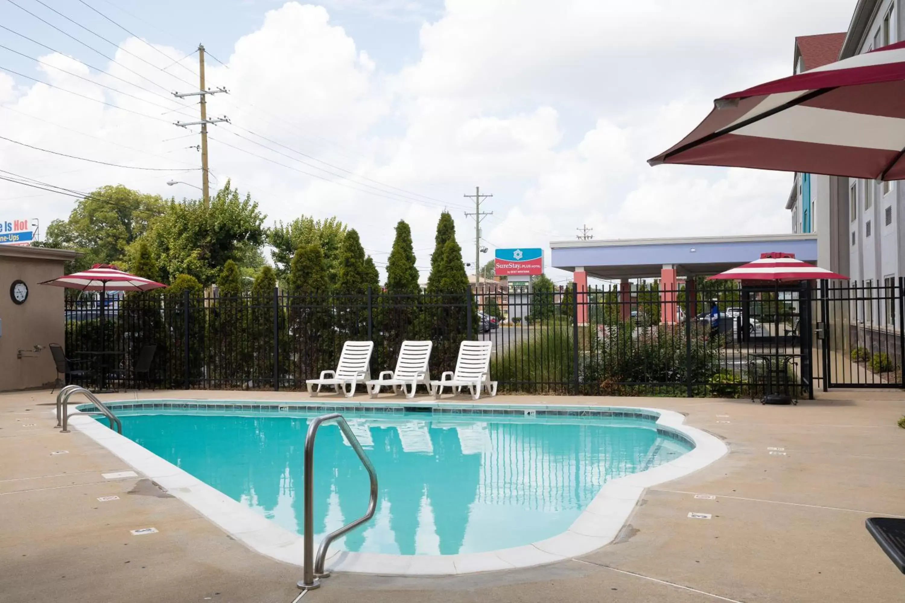 Swimming Pool in SureStay Plus by Best Western Louisville Airport Expo