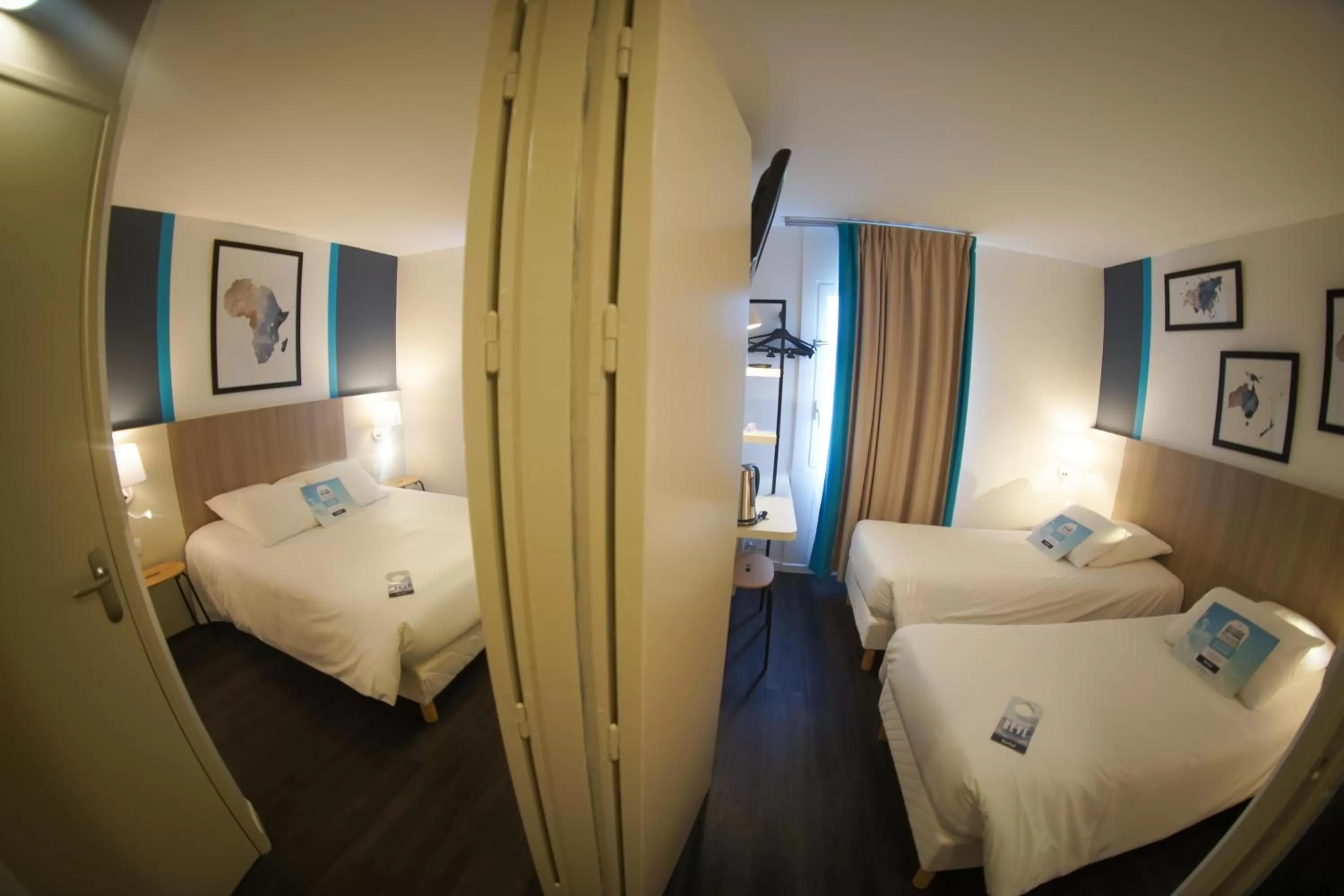 Bed in Kyriad Hôtel La Fleche