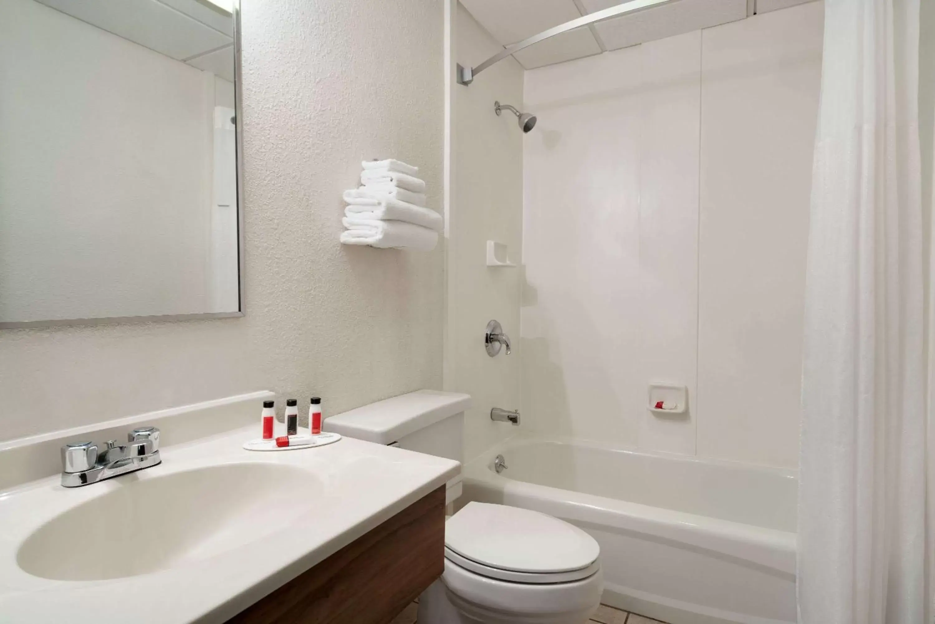 Bathroom in Super 8 by Wyndham Portland/Westbrook Area