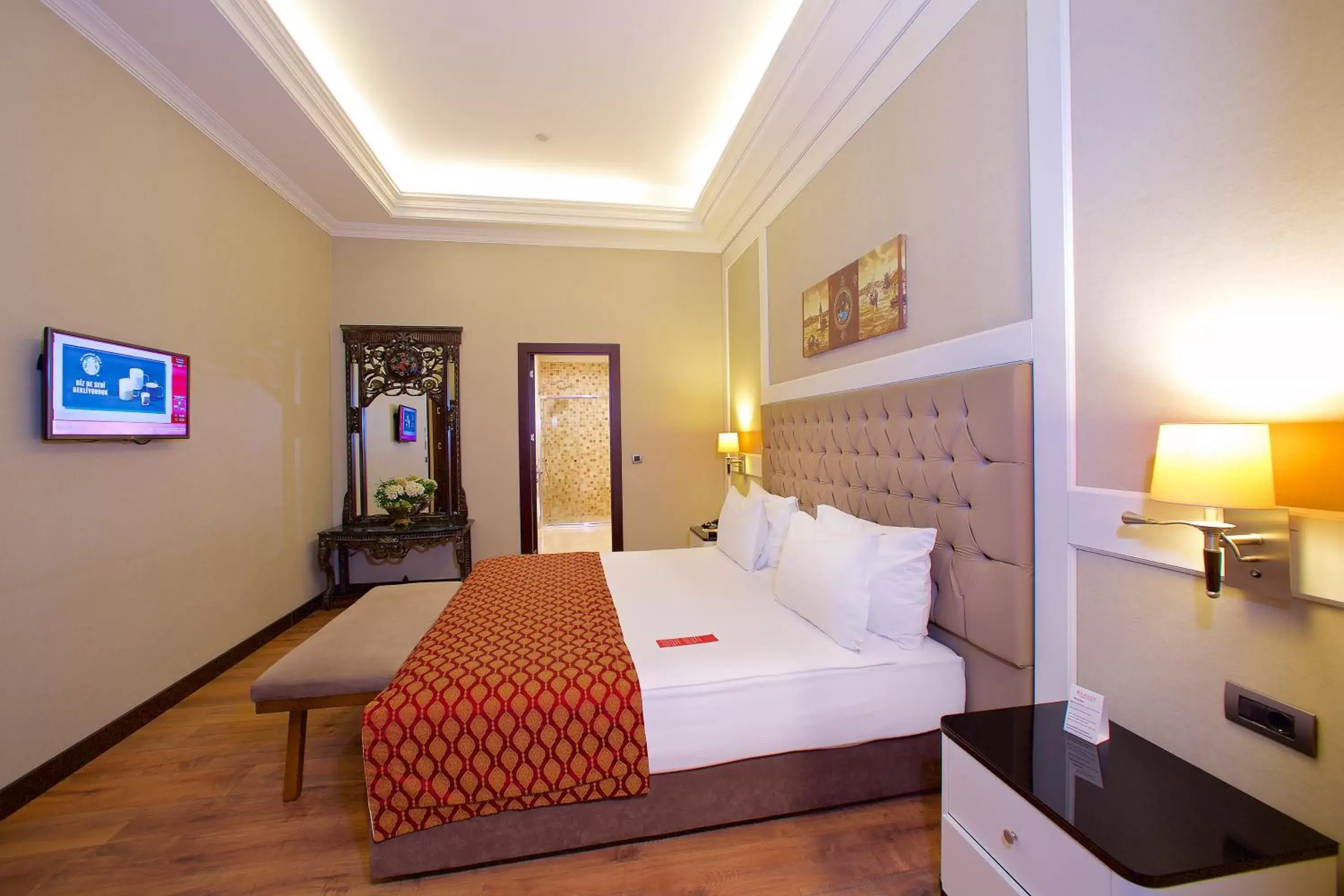 Communal lounge/ TV room, Bed in Ramada Hotel & Suites by Wyndham Istanbul Merter