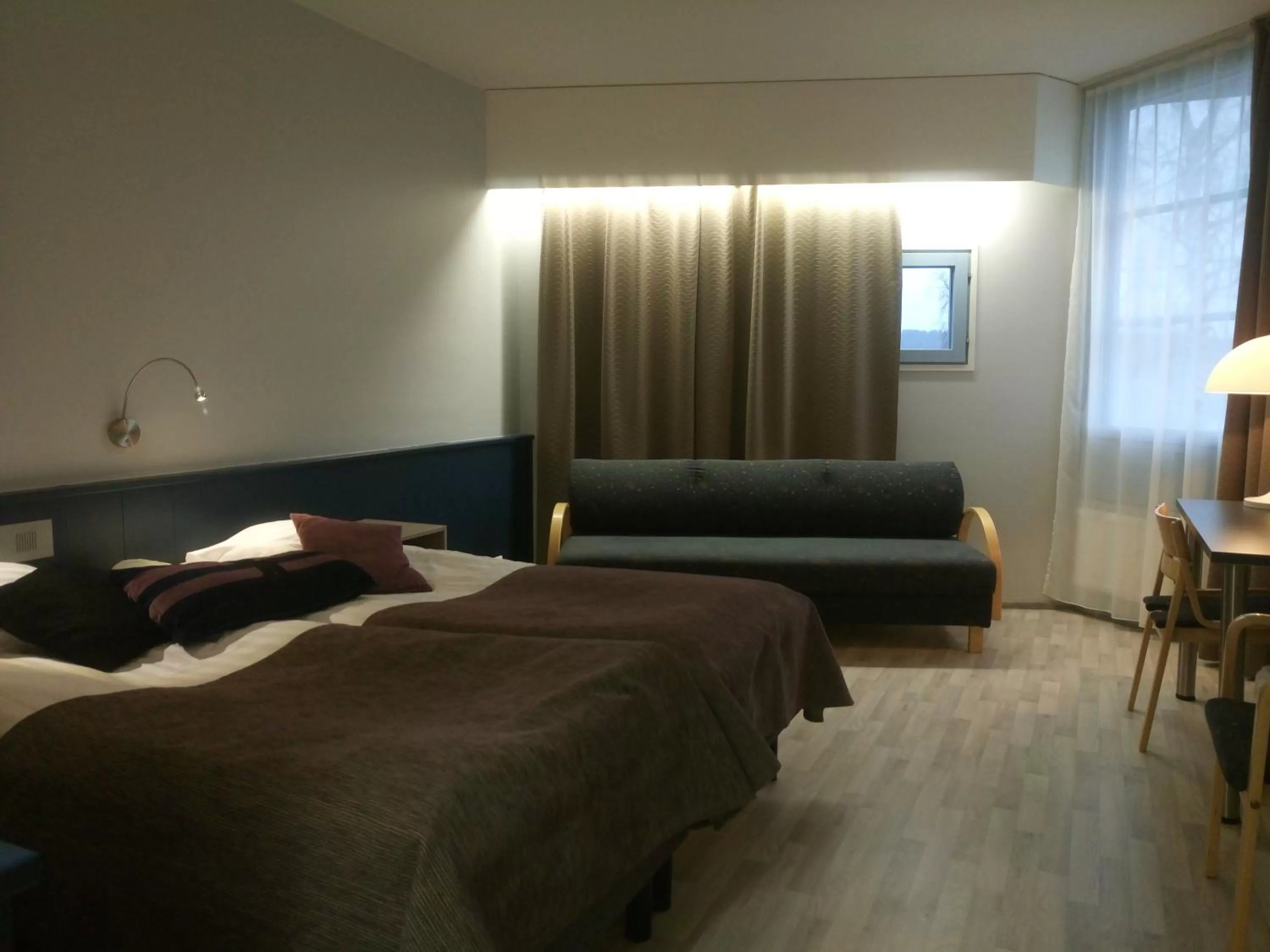 Photo of the whole room, Bed in Hotelli Kivitippu