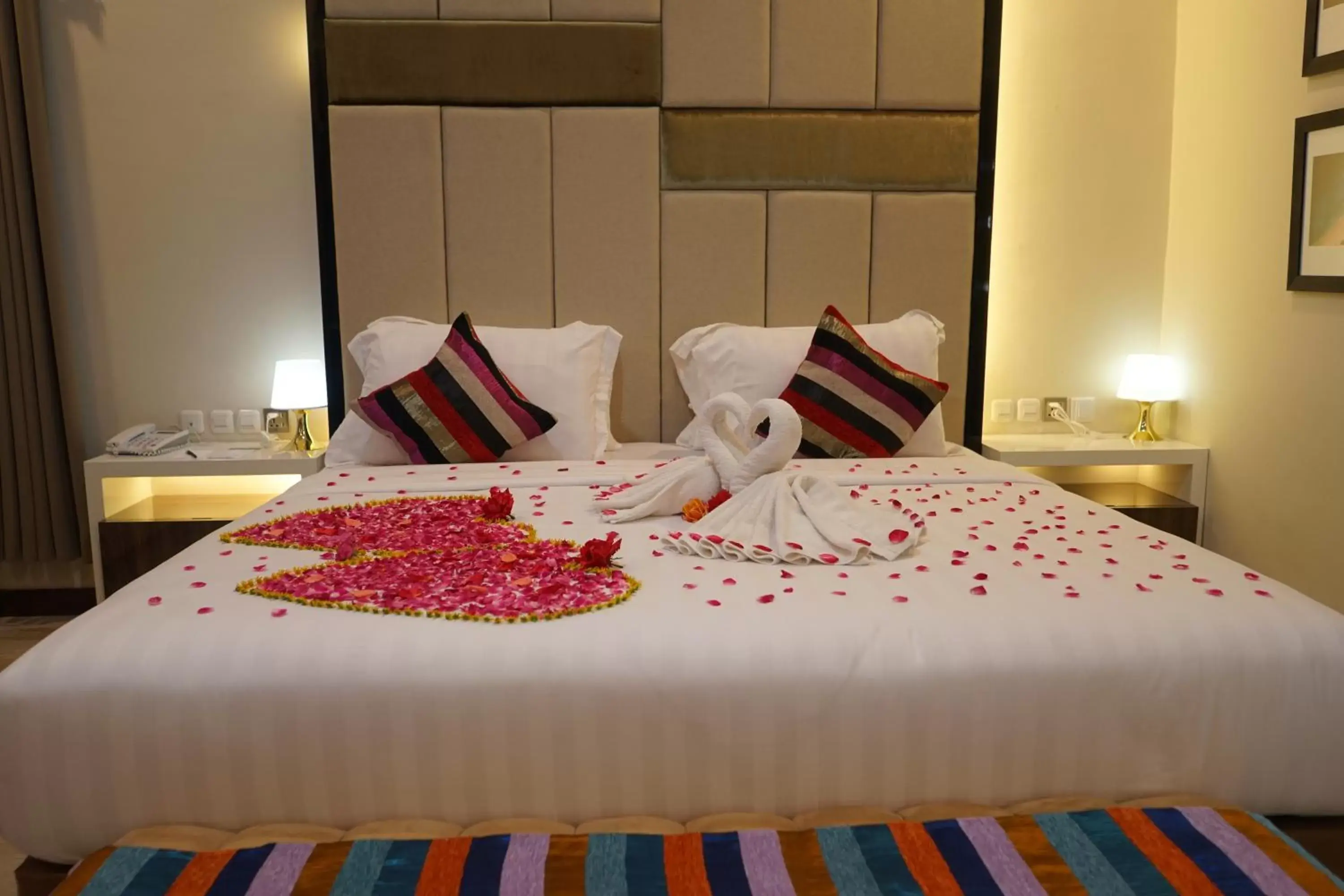 Bed in Grand Harvest Resort & Villas