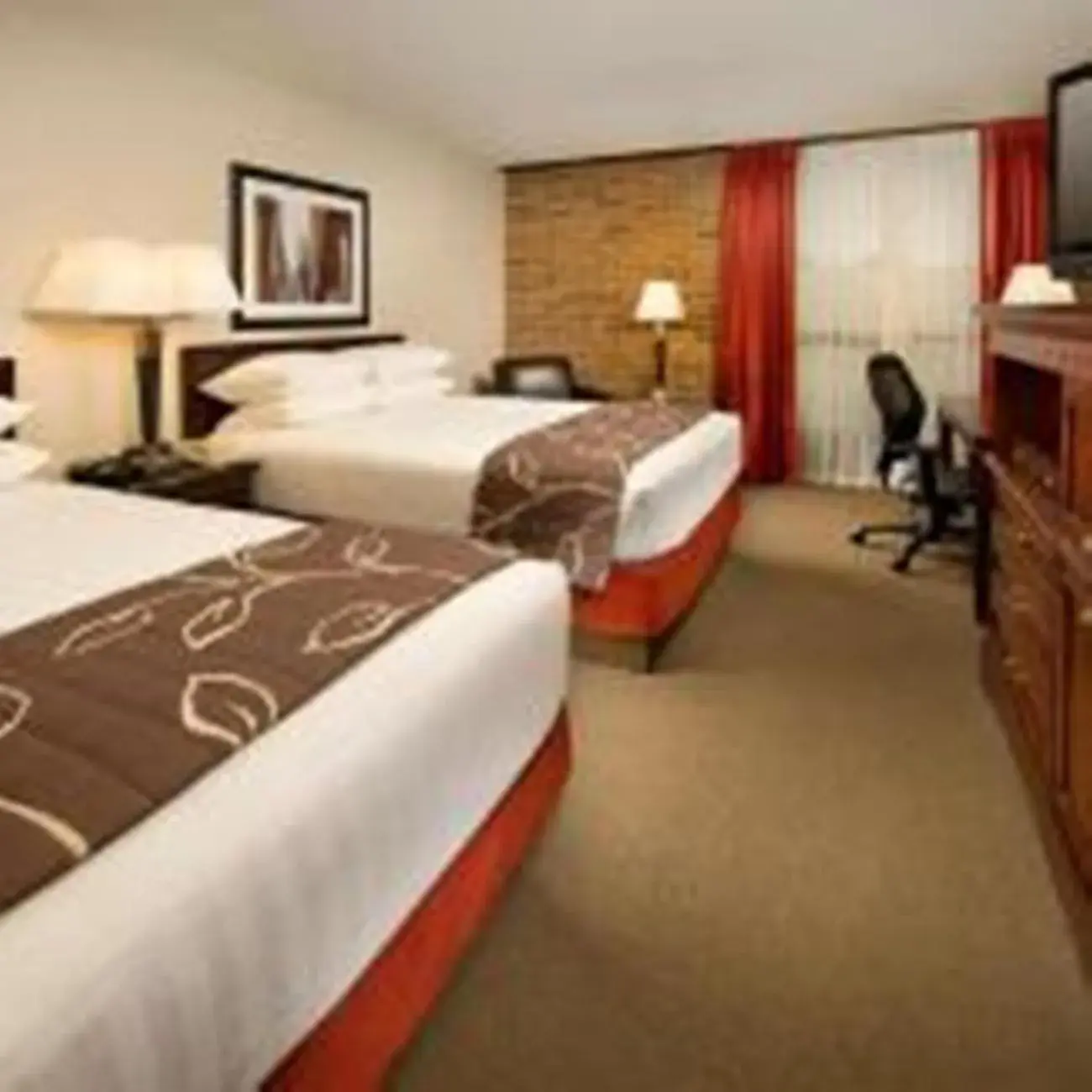 Photo of the whole room, Bed in Hotel Lotus Kansas City Merriam