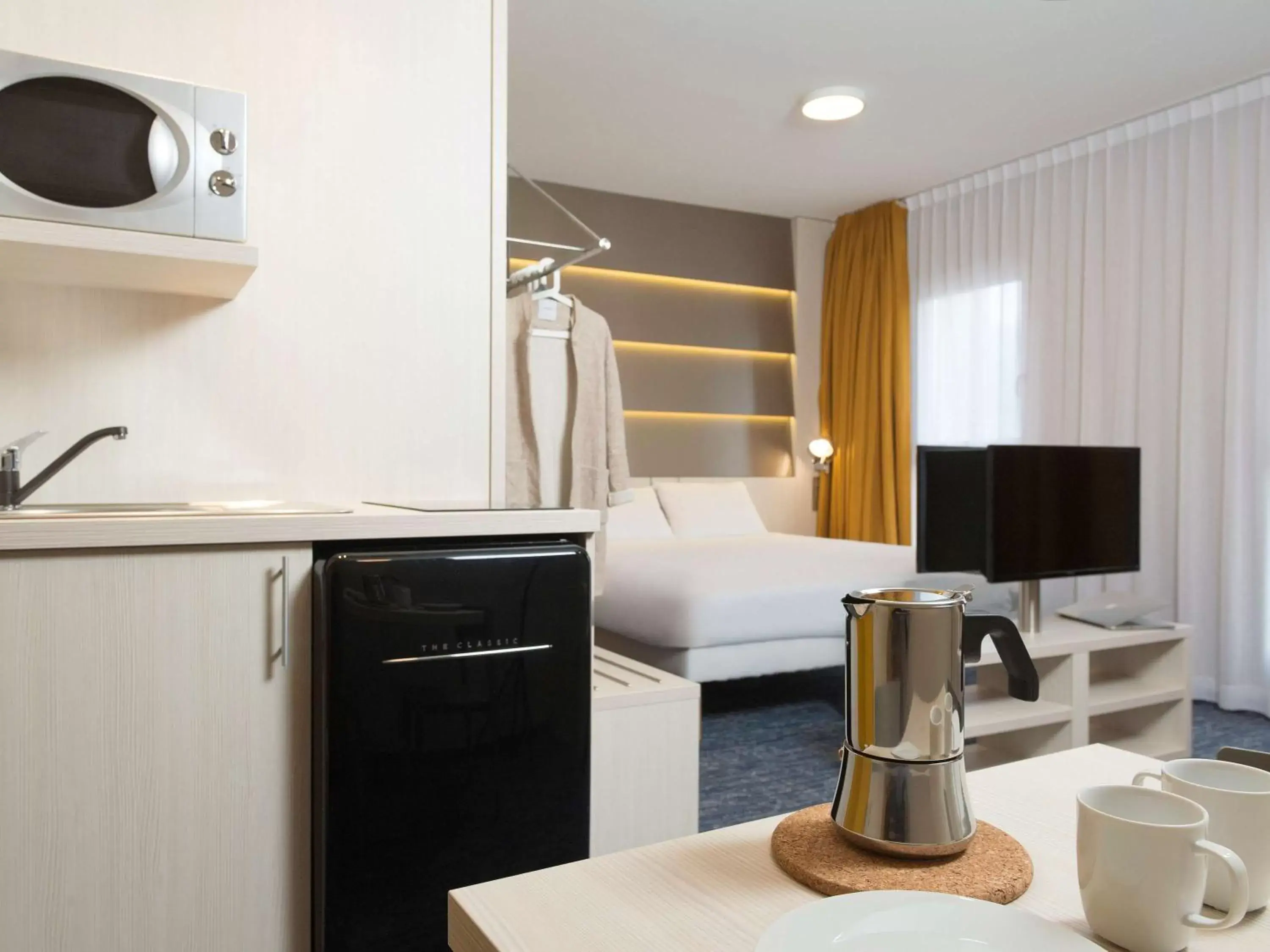 Photo of the whole room, TV/Entertainment Center in ibis Styles Nivelles