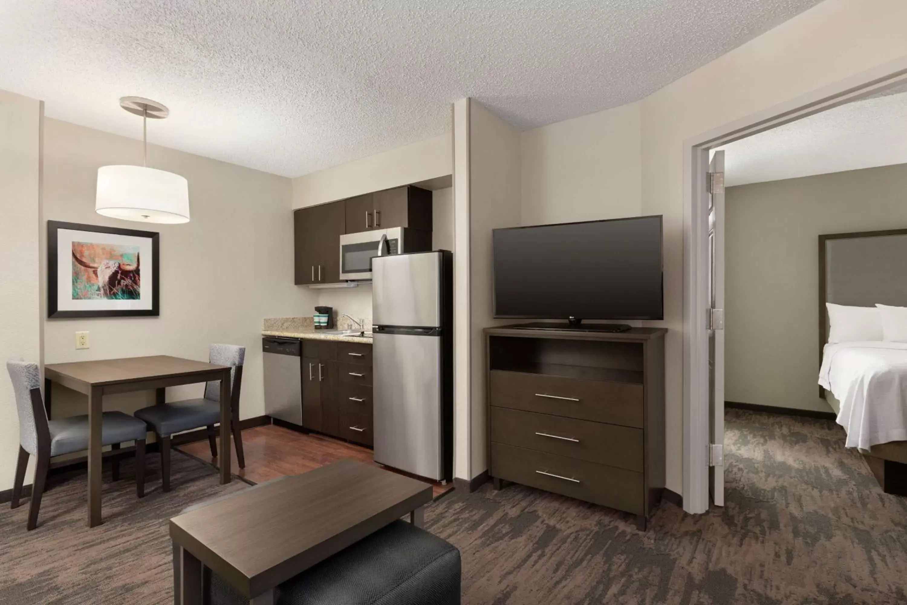 Bedroom, TV/Entertainment Center in Homewood Suites by Hilton Dallas-Plano