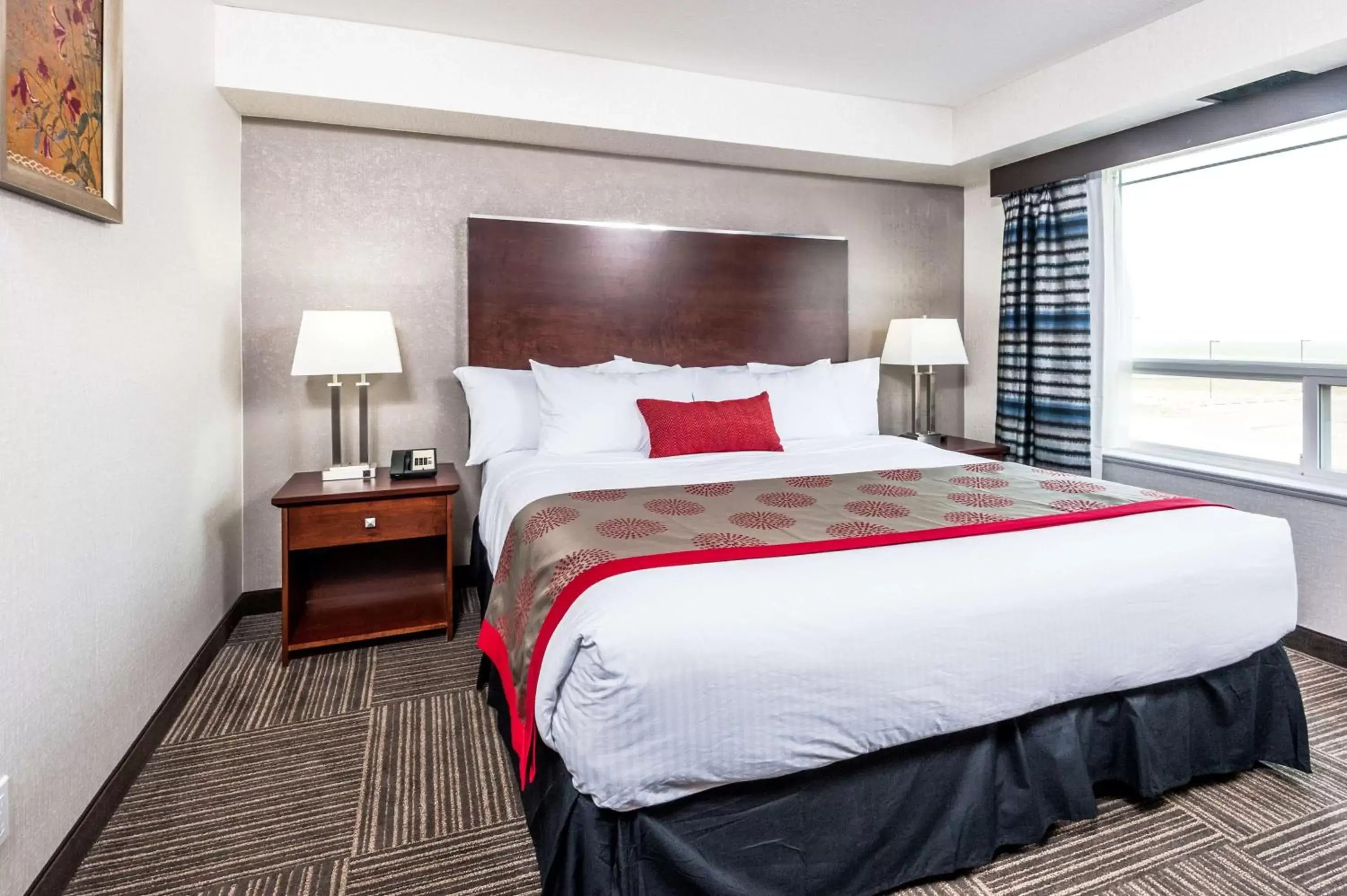 Two-Bedroom Suite with One King and One Queen Beds - Non-Smoking in Ramada by Wyndham Moose Jaw