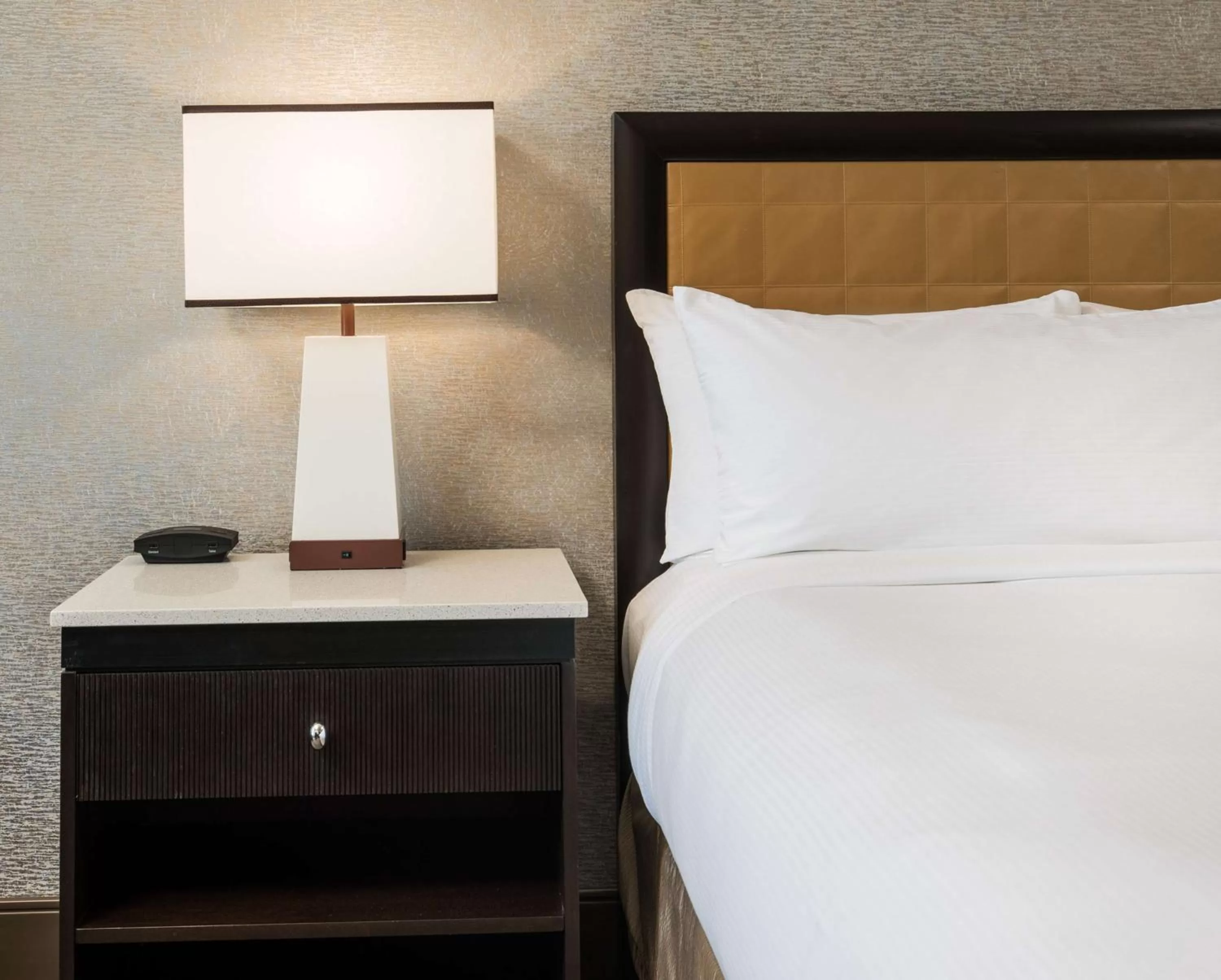 Bed in The Saratoga Hilton