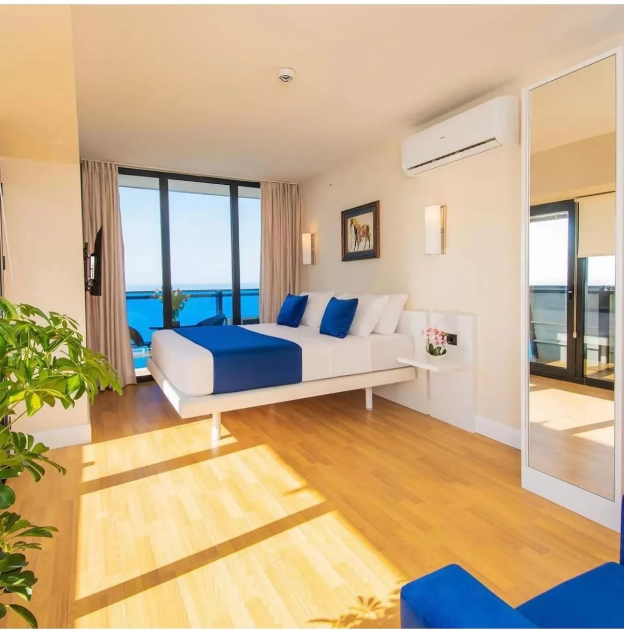 Bed, Seating Area in Orbi City Luxury Suite