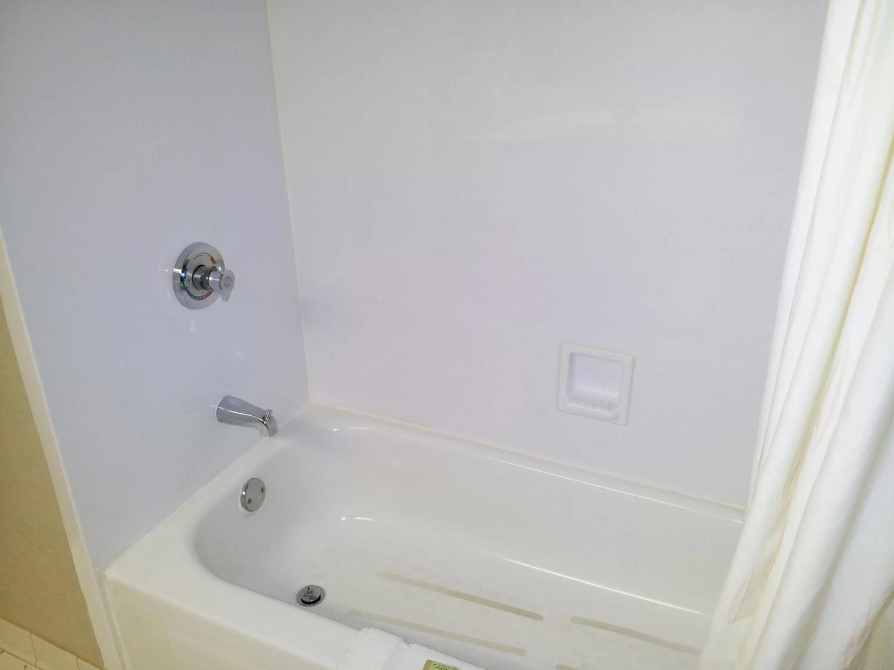 Bathroom in Super 8 by Wyndham Dawsonville