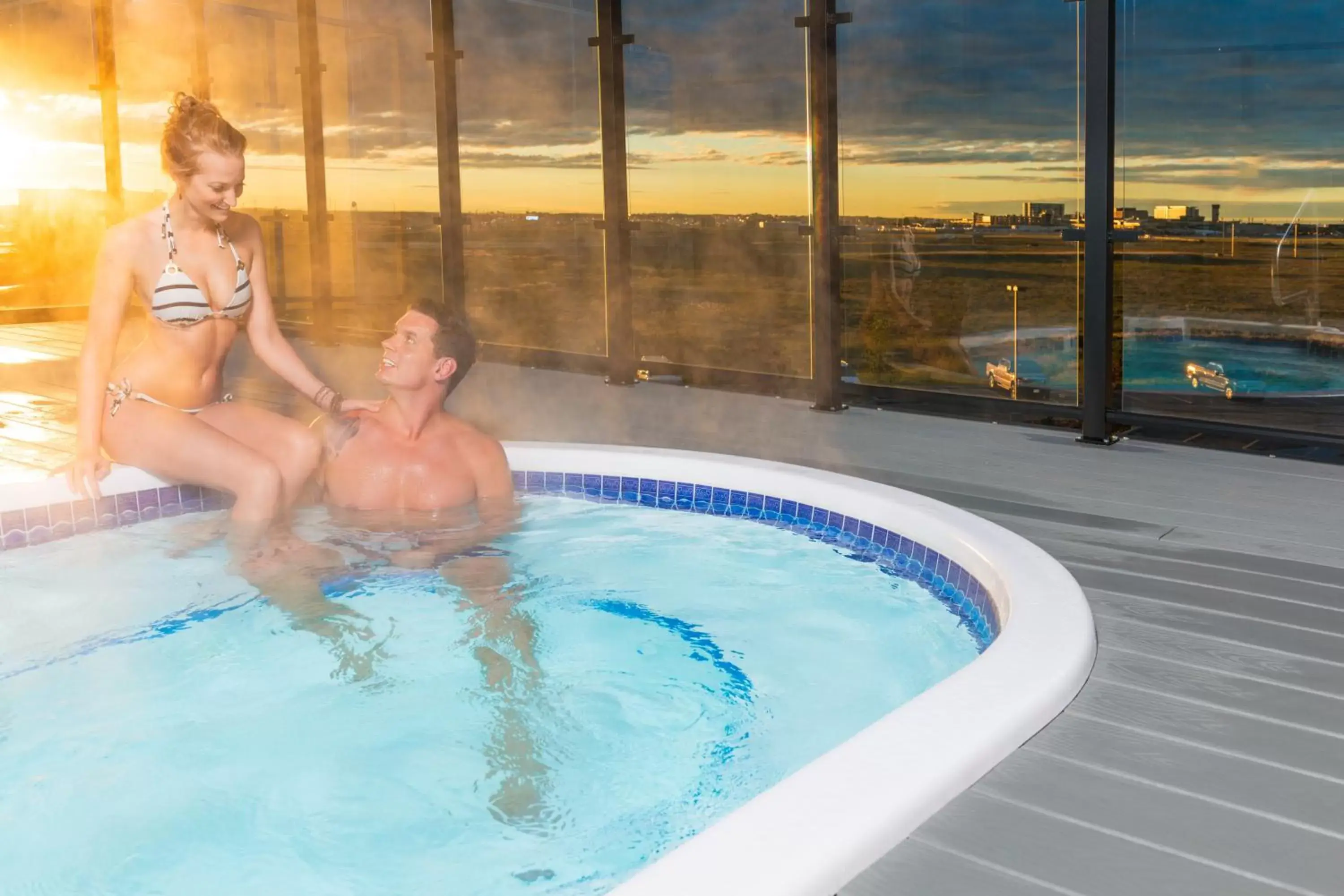 Swimming pool in Applause Hotel Calgary Airport by CLIQUE Swimming pool in Applause Hotel Calgary Airport by CLIQUE