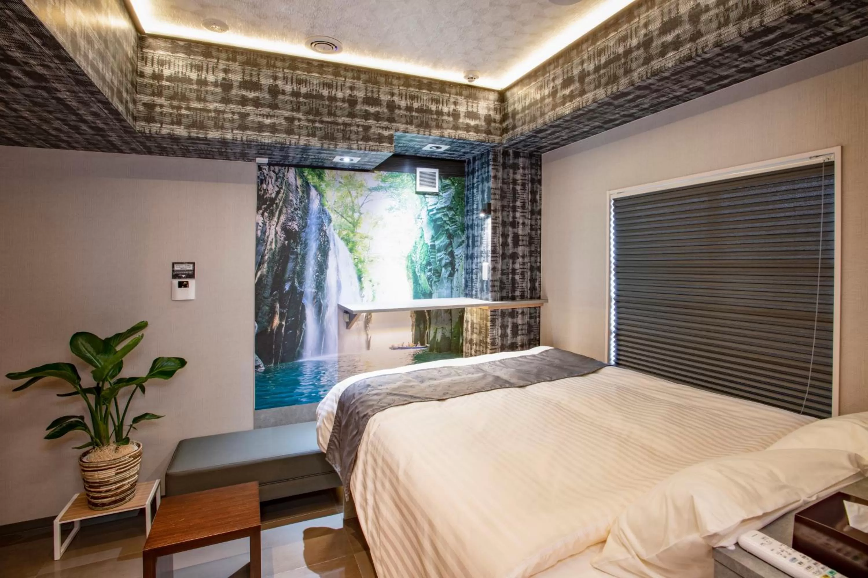 Bed in Hotel Xcell Hiroshima Nagarekawa