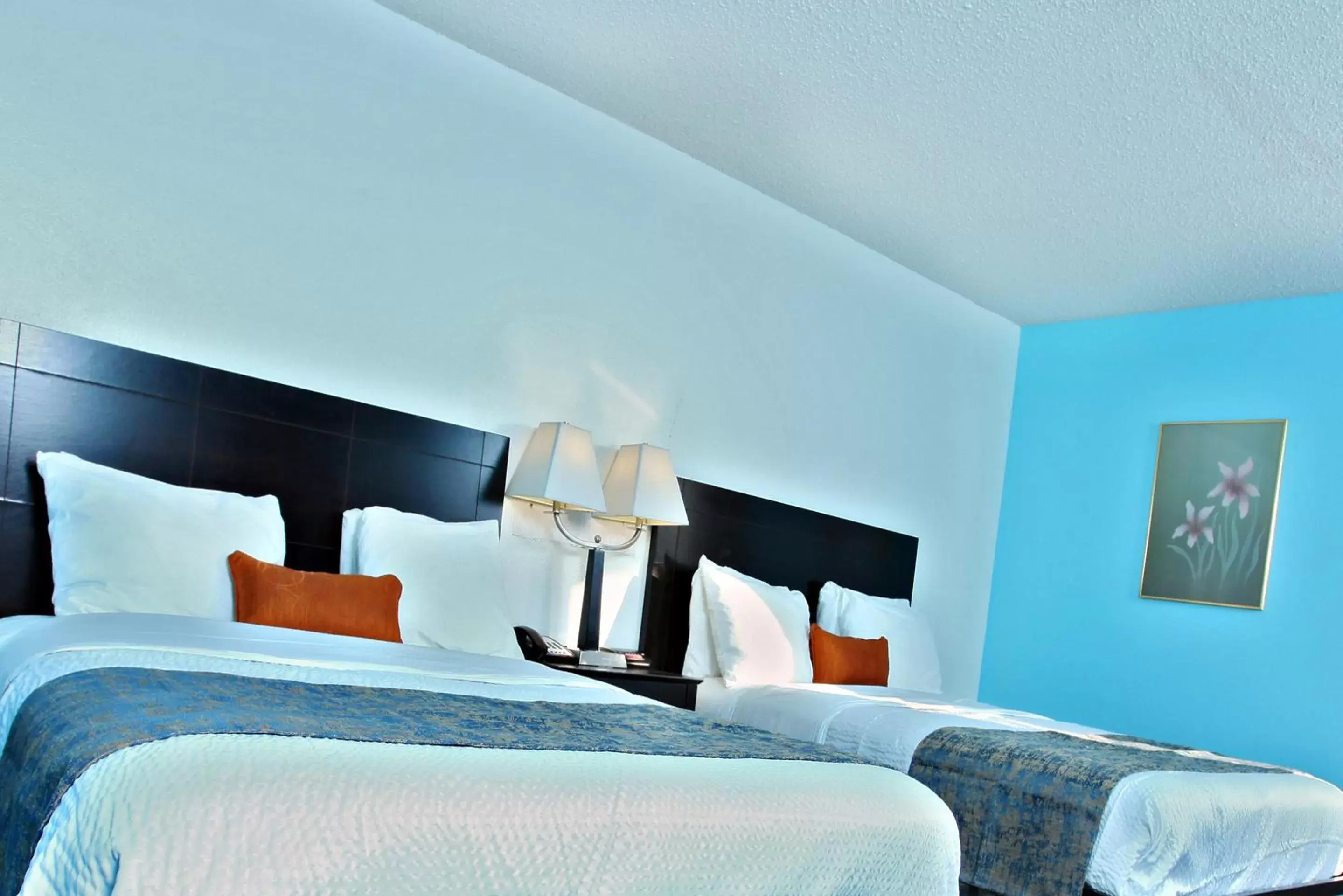 Bed in Coratel Inn & Suites by Jasper Newton