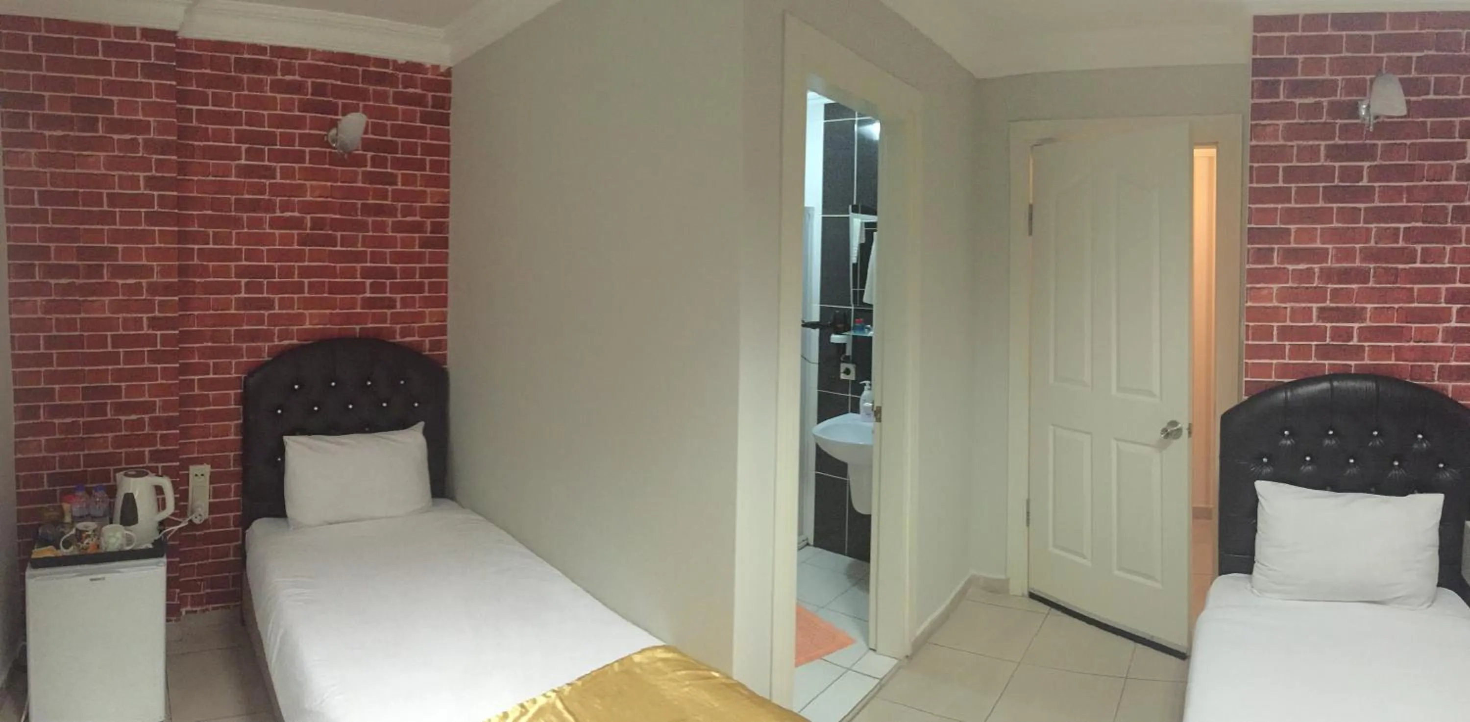 Shower, Bed in Lotus Hotel