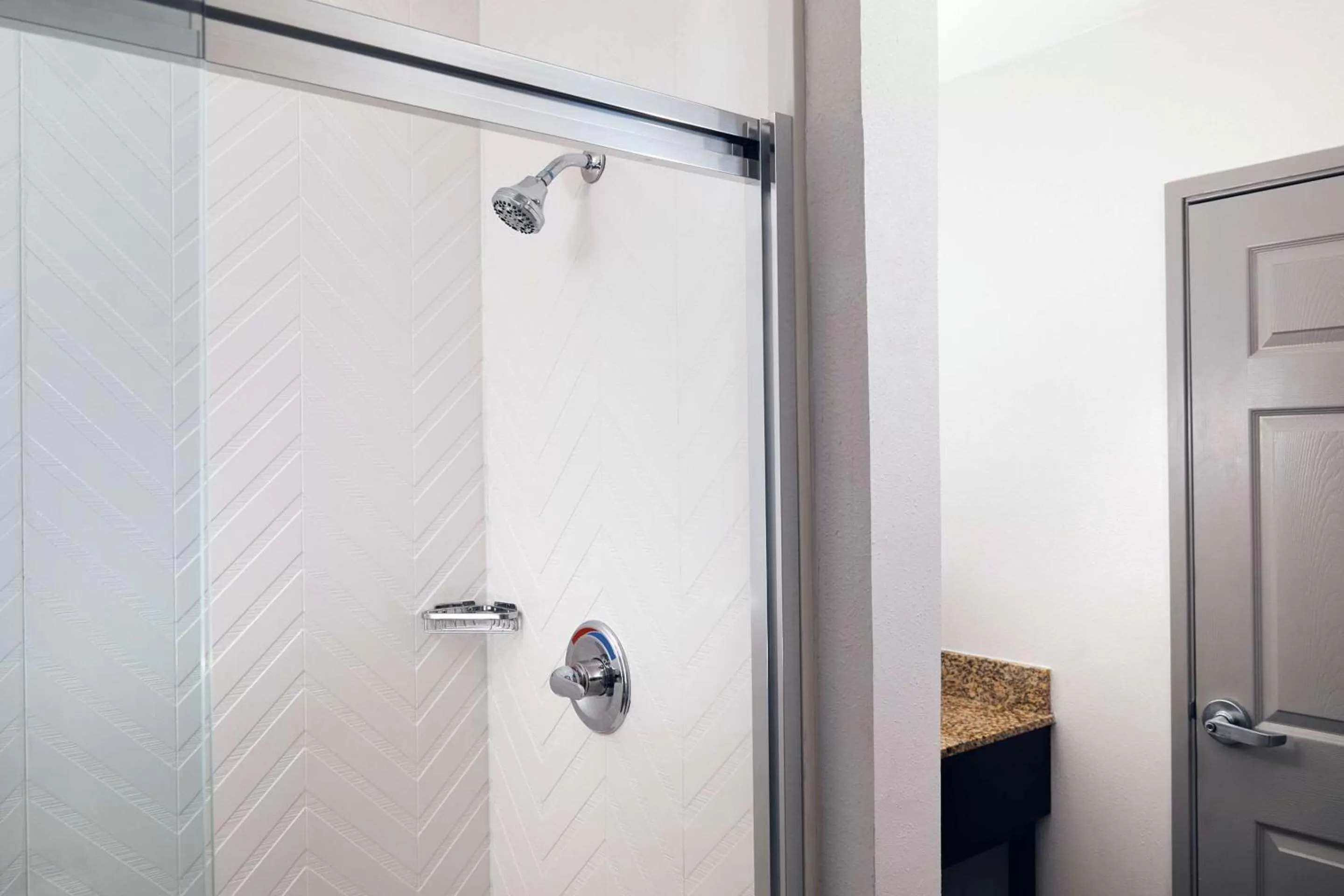 Bedroom in Comfort Suites Milwaukee Airport