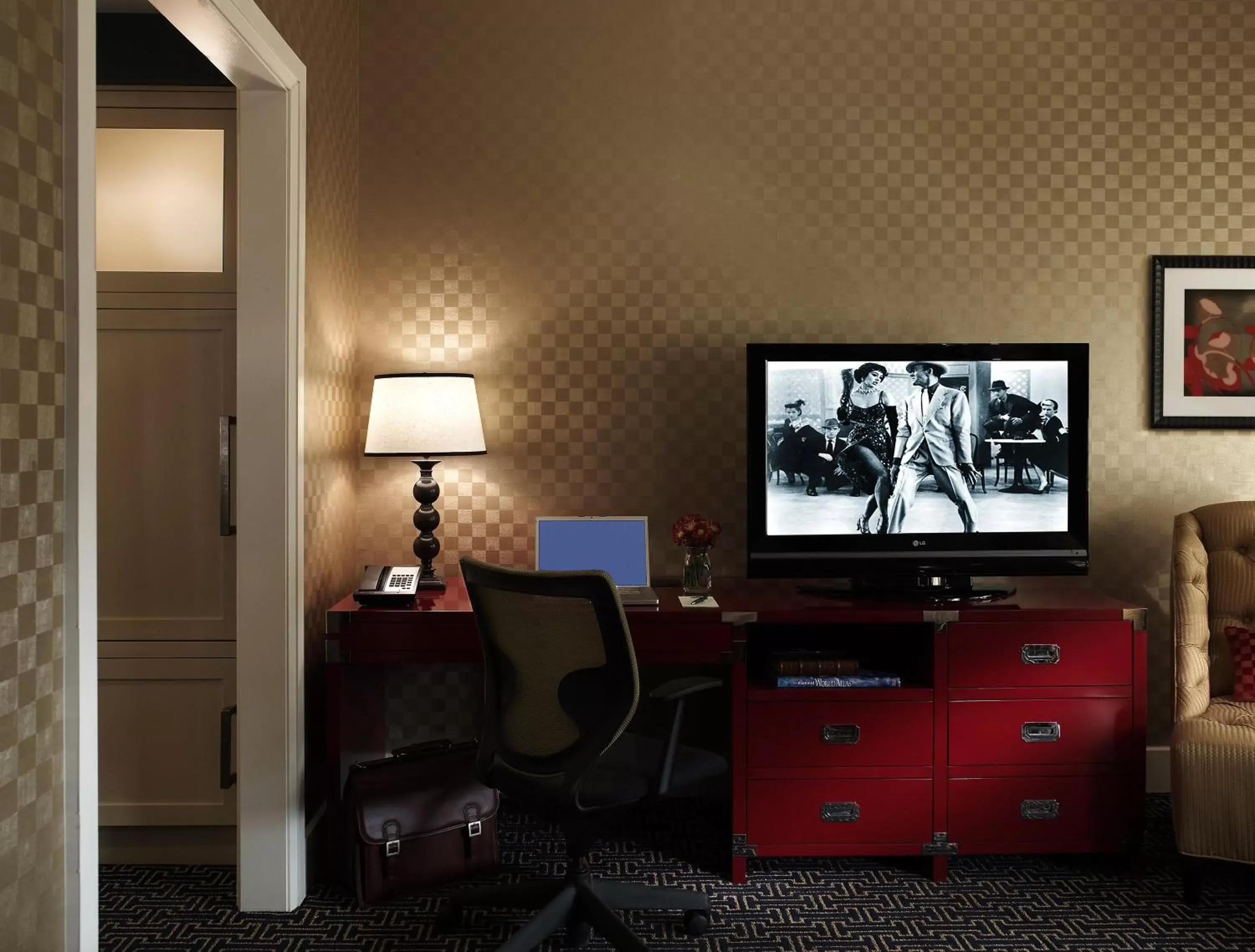 Photo of the whole room, TV/Entertainment Center in Kimpton Hotel Monaco Baltimore Inner Harbor, an IHG Hotel