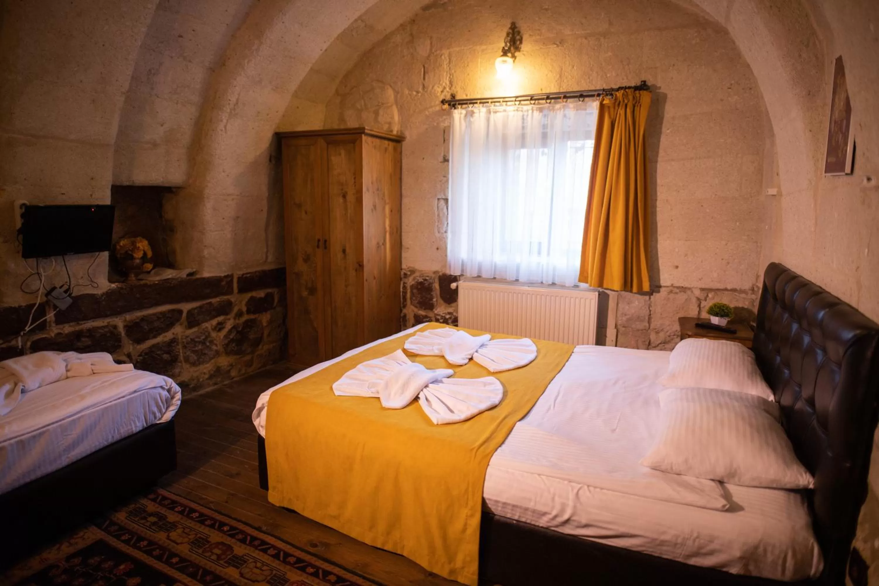 Bed in 7 Oda Kapadokya Cave Hotel