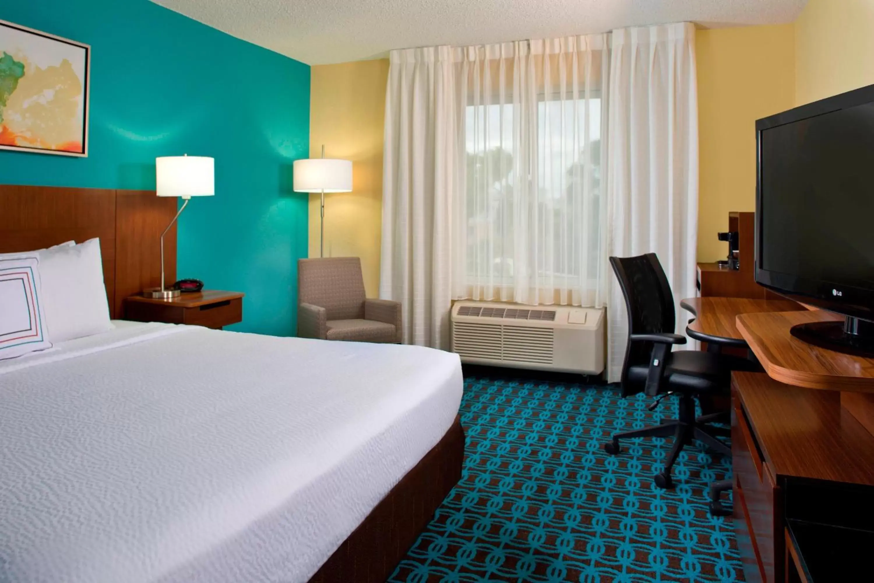 Photo of the whole room, Bed in Fairfield Inn & Suites by Marriott Orlando Lake Buena Vista in the Marriott Village