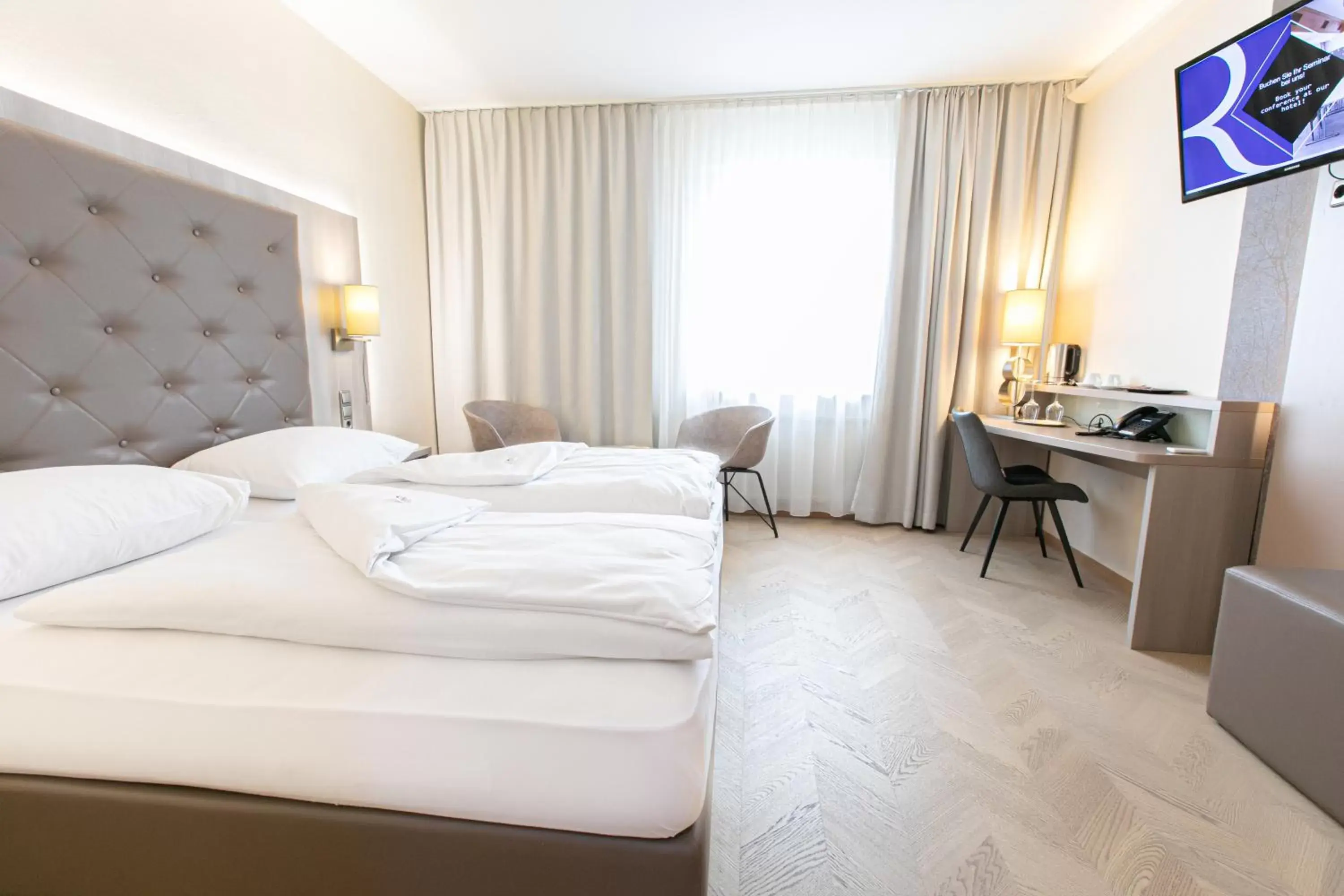 Photo of the whole room, Bed in Das Reinisch Airport Hotel & Restaurant