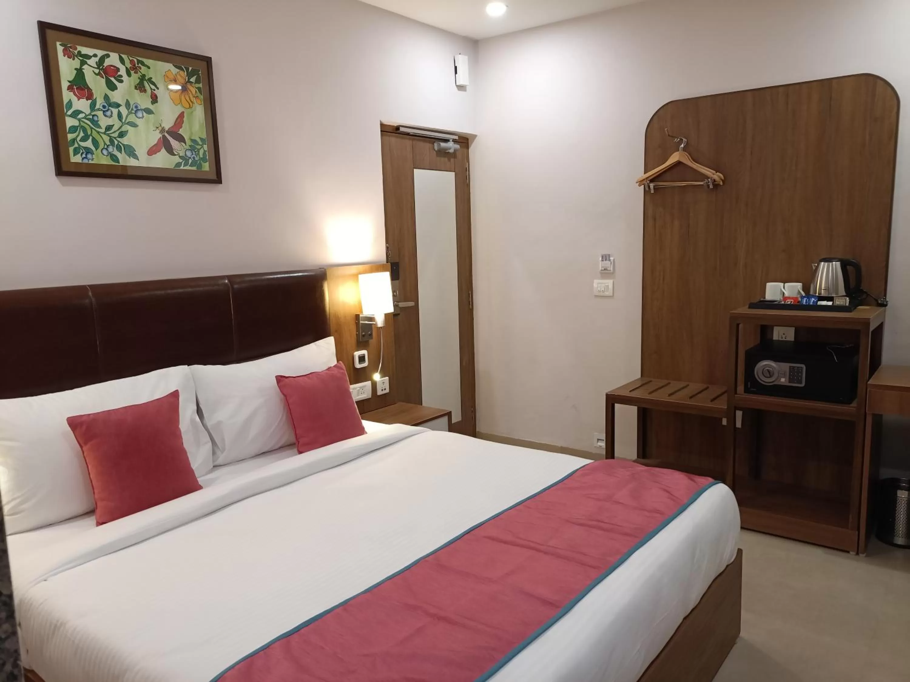 Bed in The Beacon Hotel Vadodara