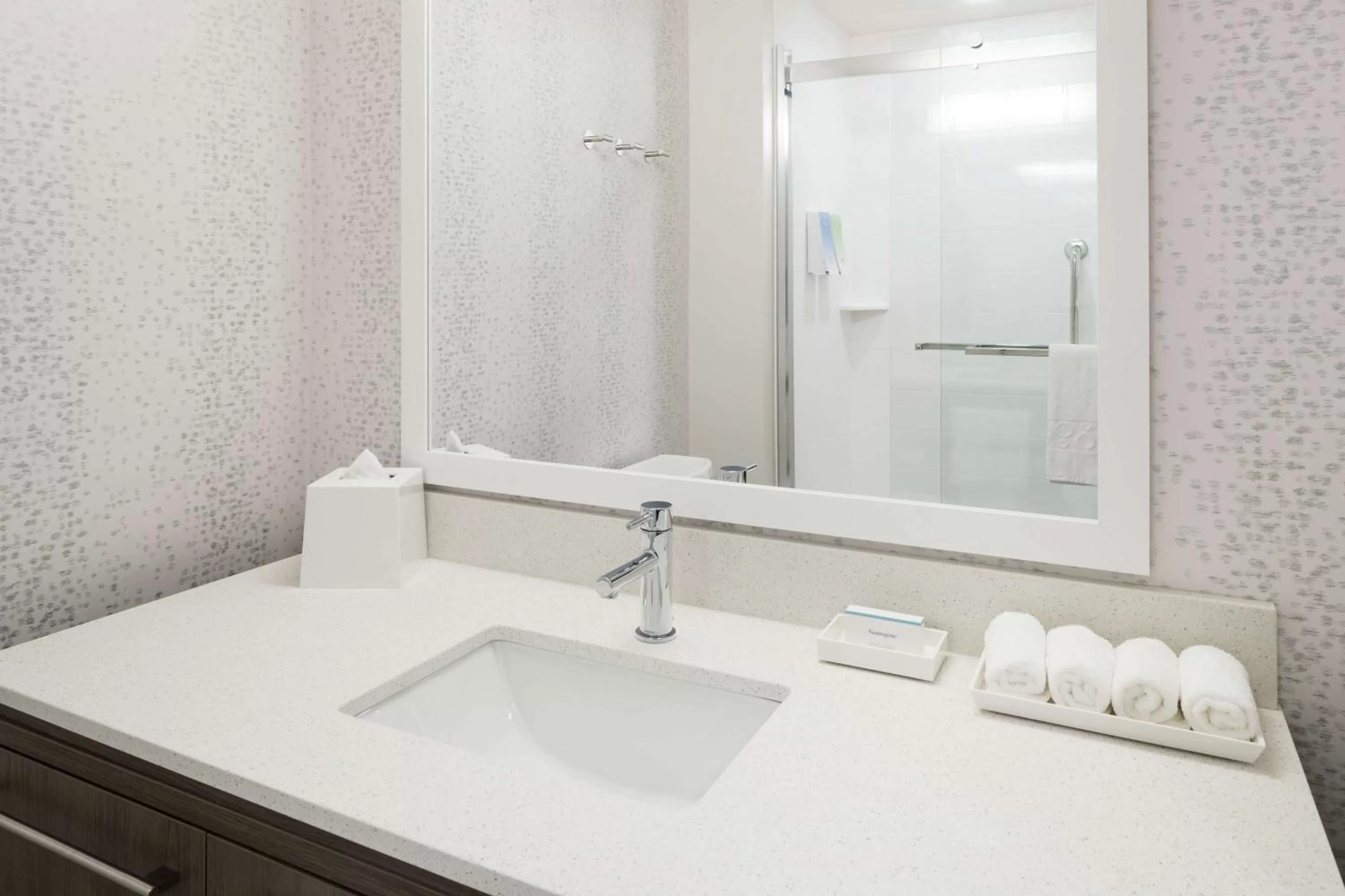 Bathroom in Home2 Suites By Hilton Orlando Airport