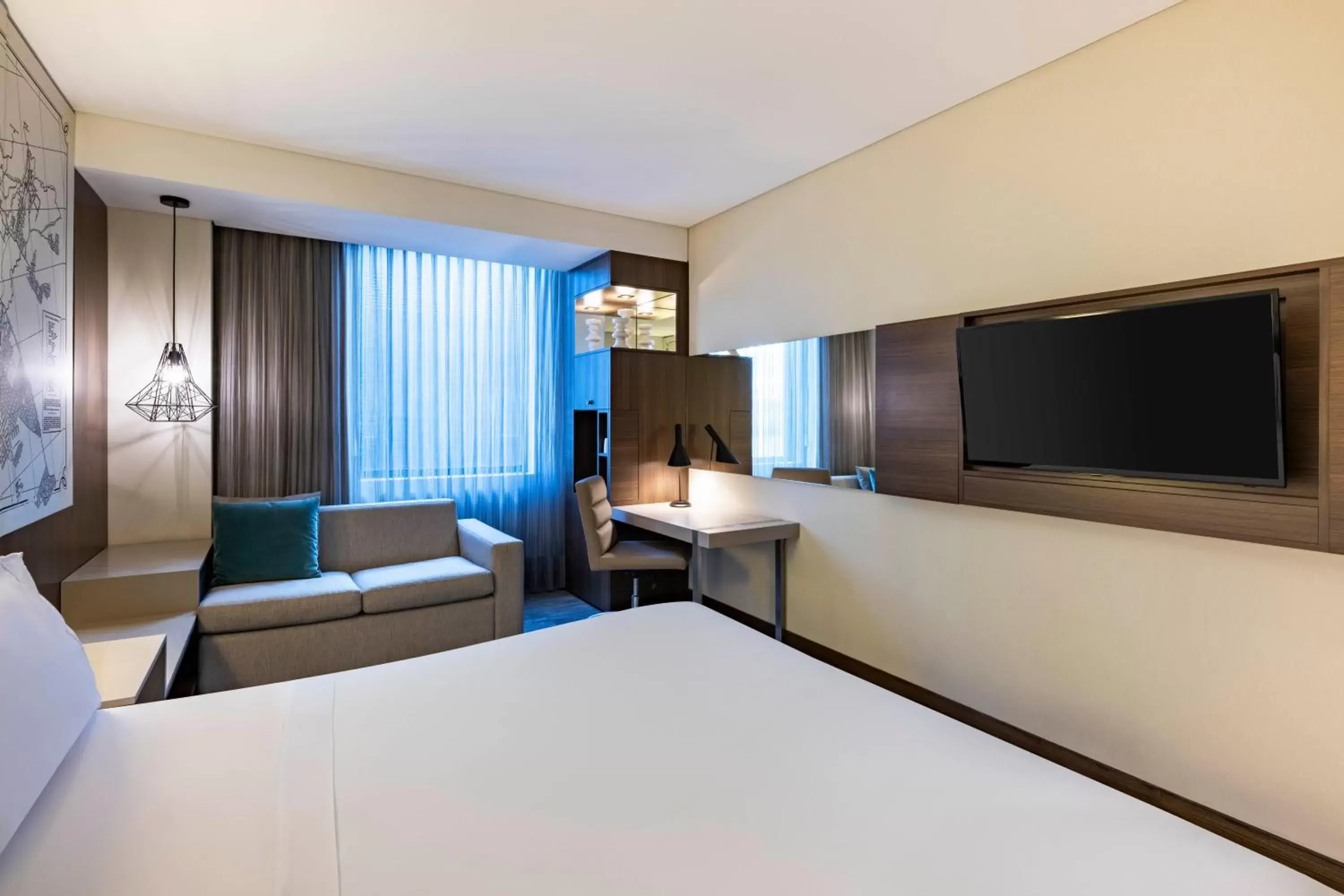 room service, TV/Entertainment Center in Courtyard by Marriott Bogota Airport