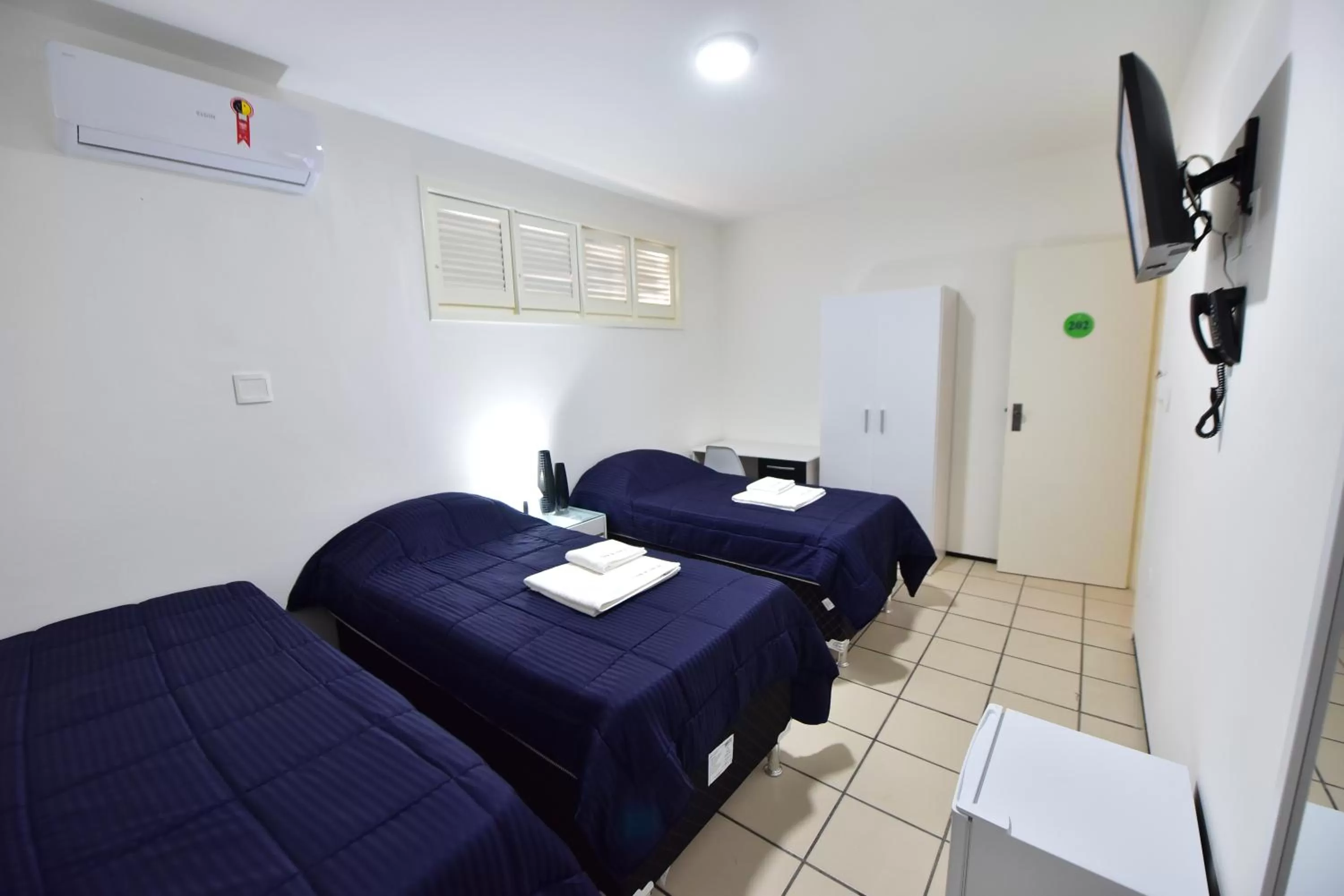 Bed in LIVE IN FORTALEZA HOTEL