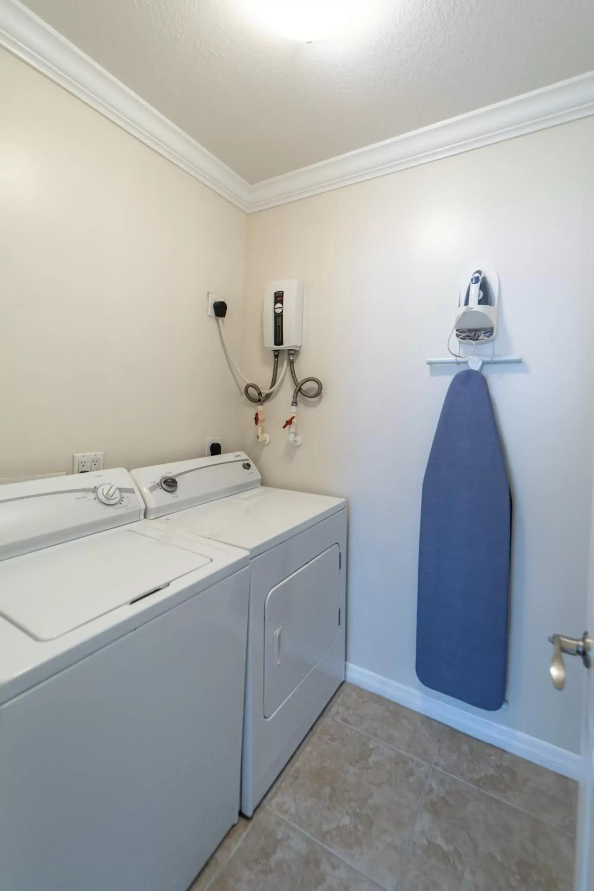laundry, Bathroom in Holiday Inn Resort Grand Cayman, an IHG Hotel