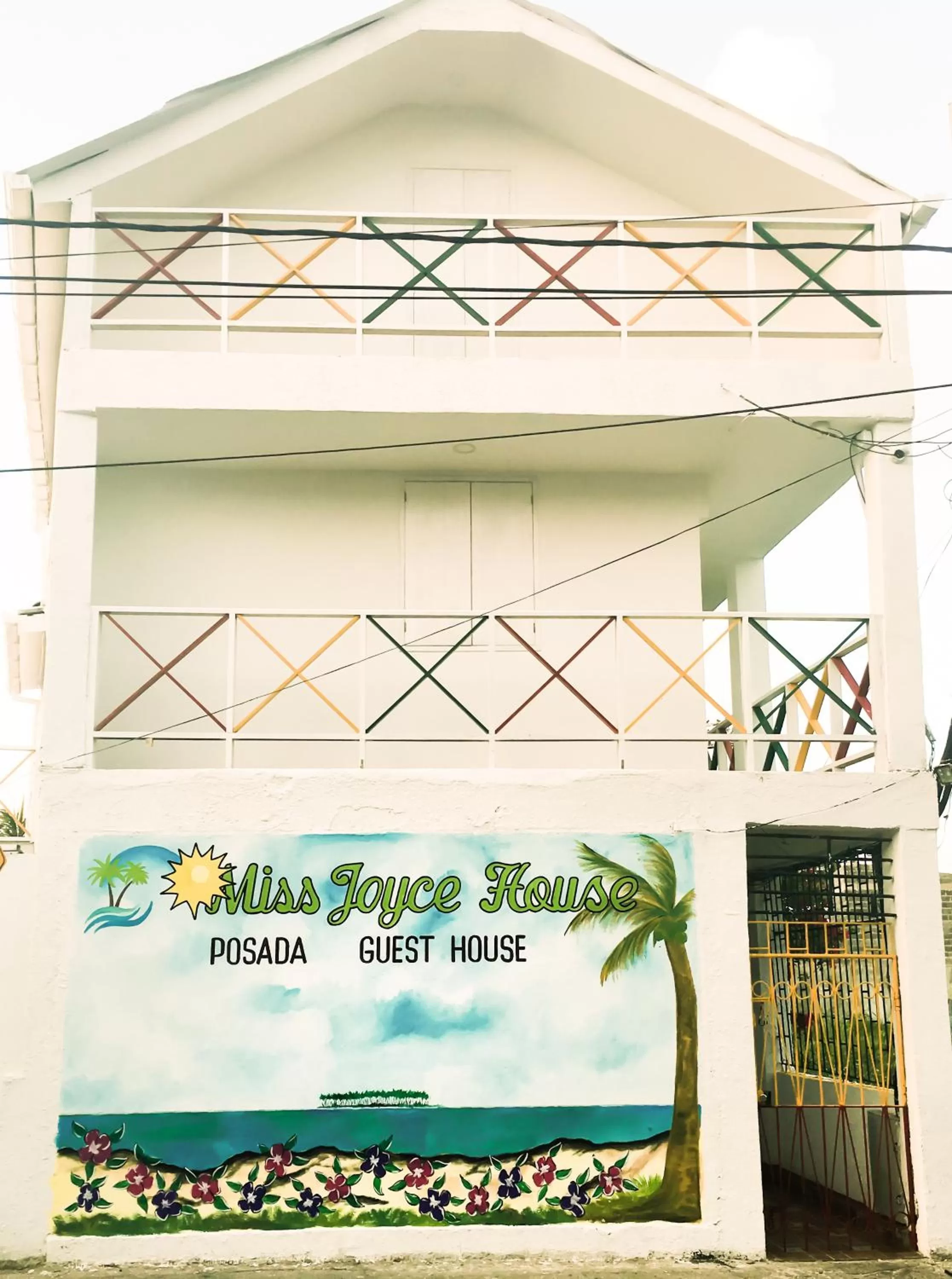 Property logo or sign in Posada Miss Joyce House