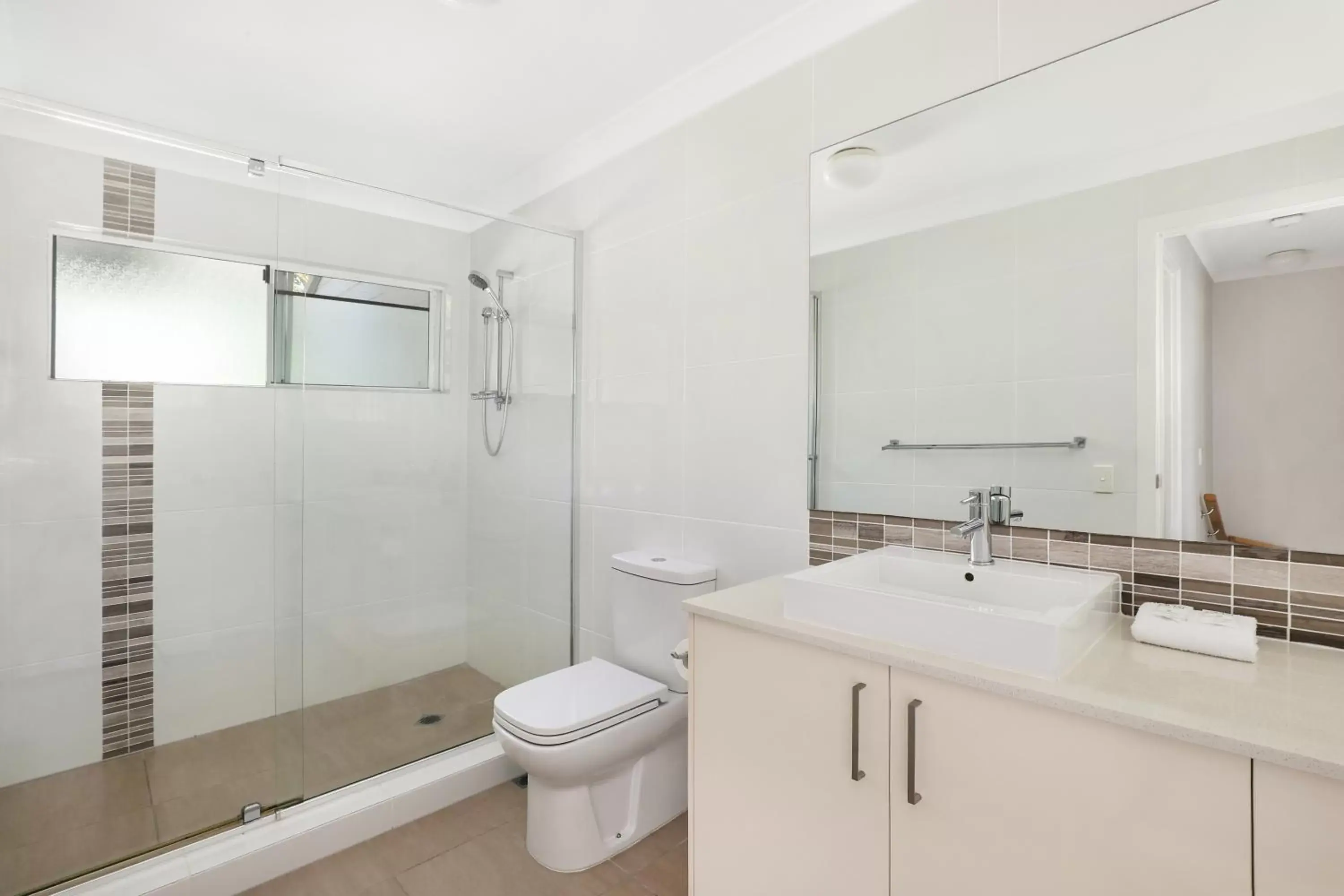 Bathroom in Coral Beach Noosa Resort