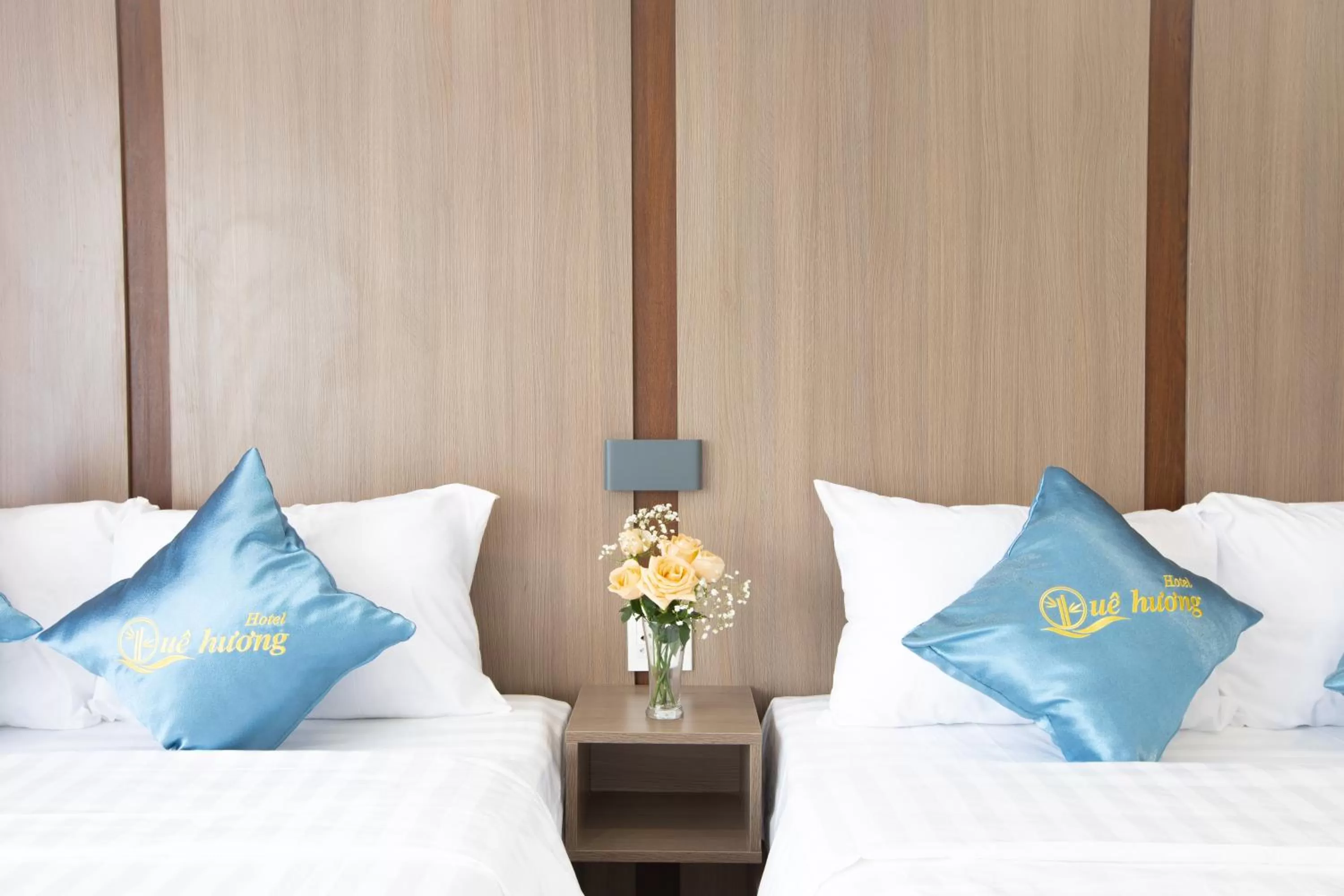 Bed in QUE HUONG HOTEL