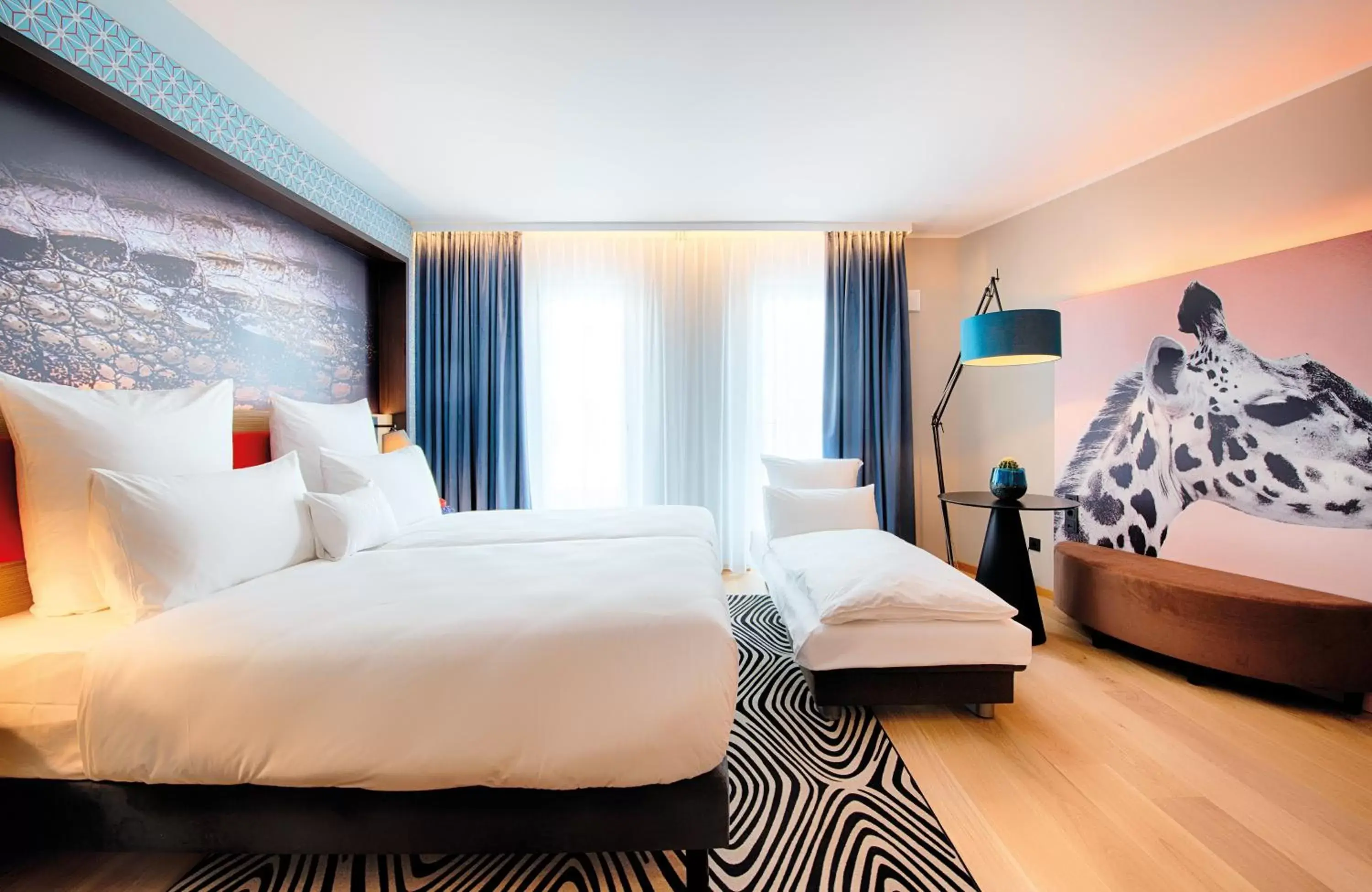 Photo of the whole room, Bed in NYX Hotel Munich by Leonardo Hotels