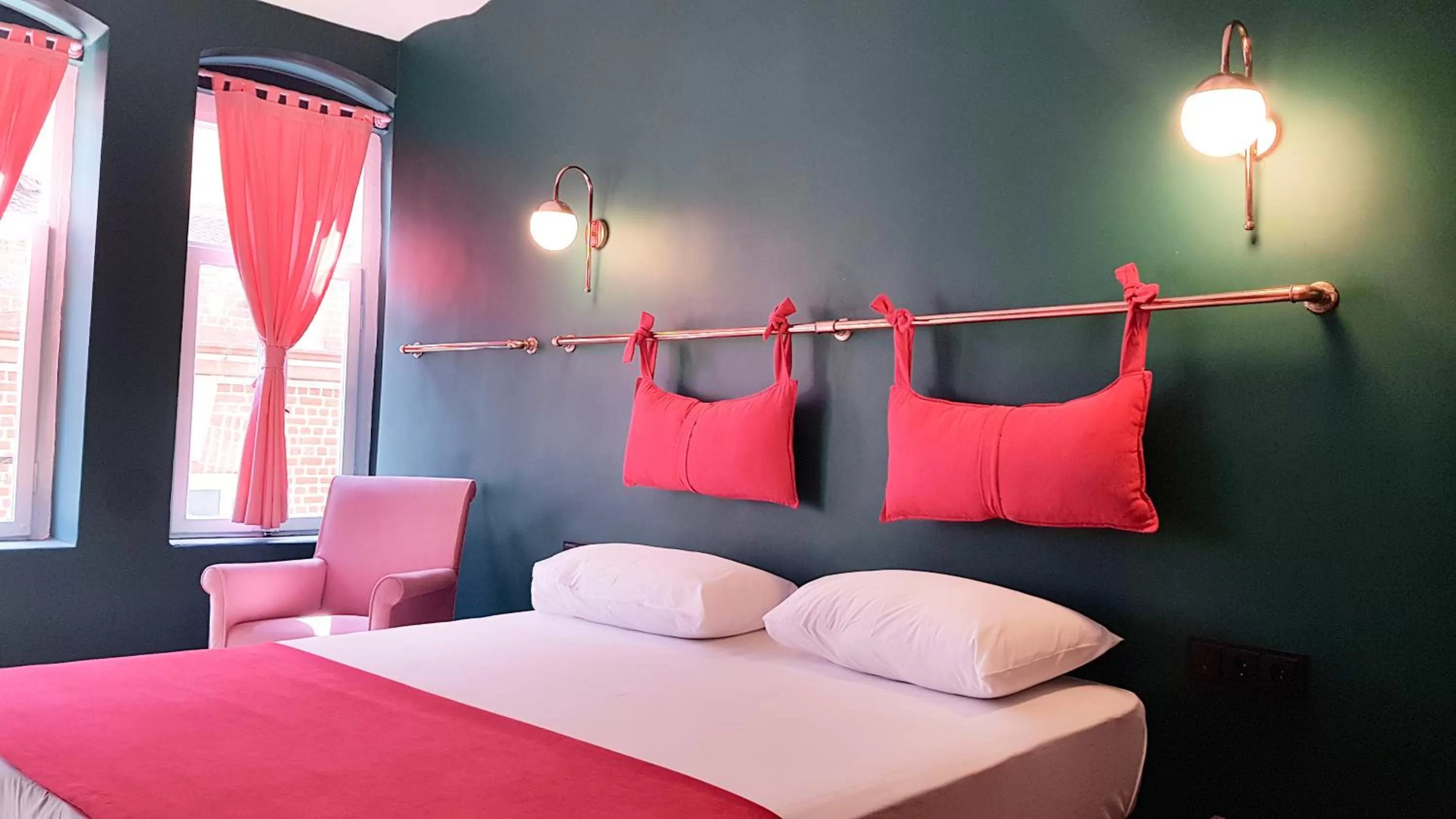 Bed in Casa Rosa Suites