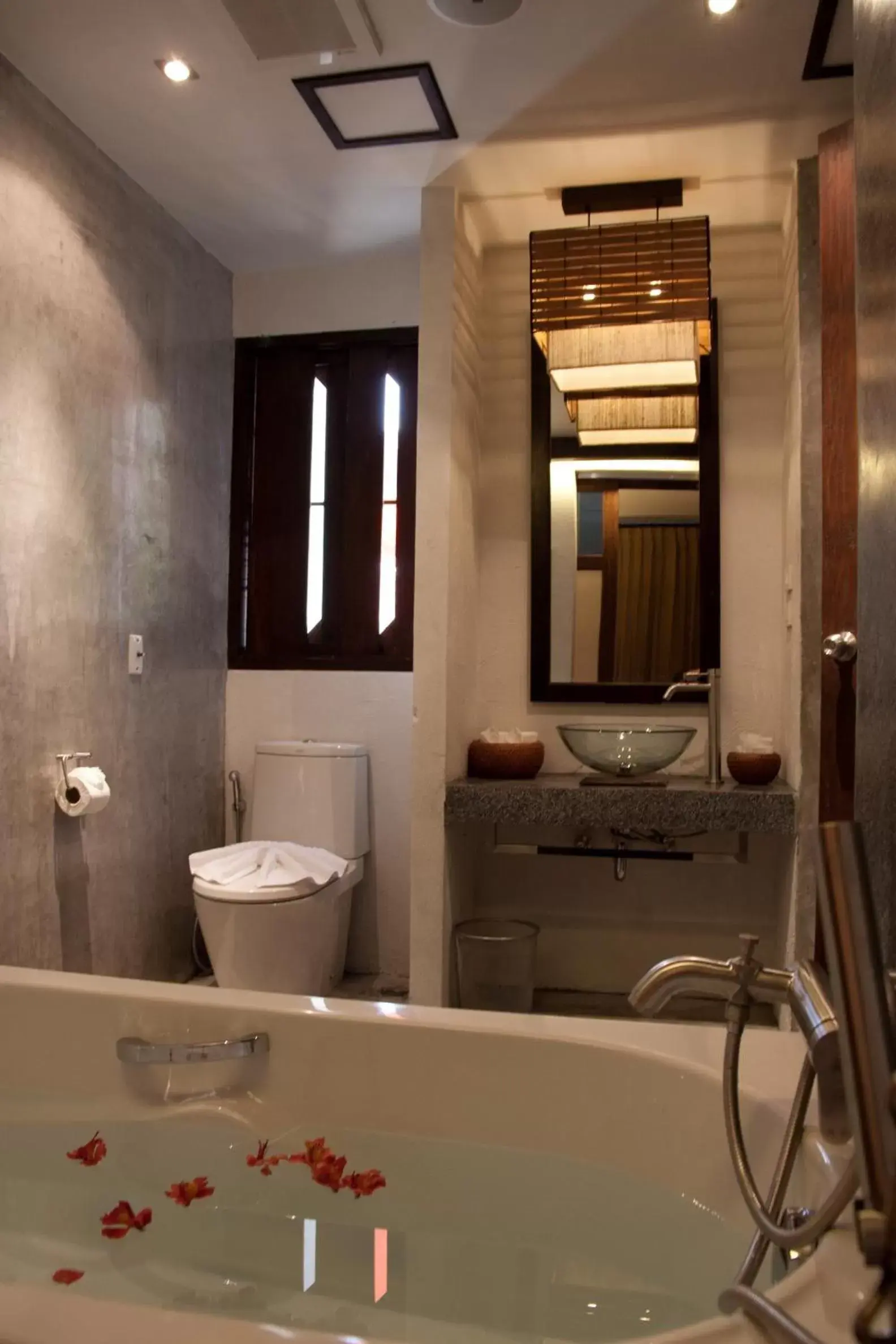Bathroom in De Lanna Hotel