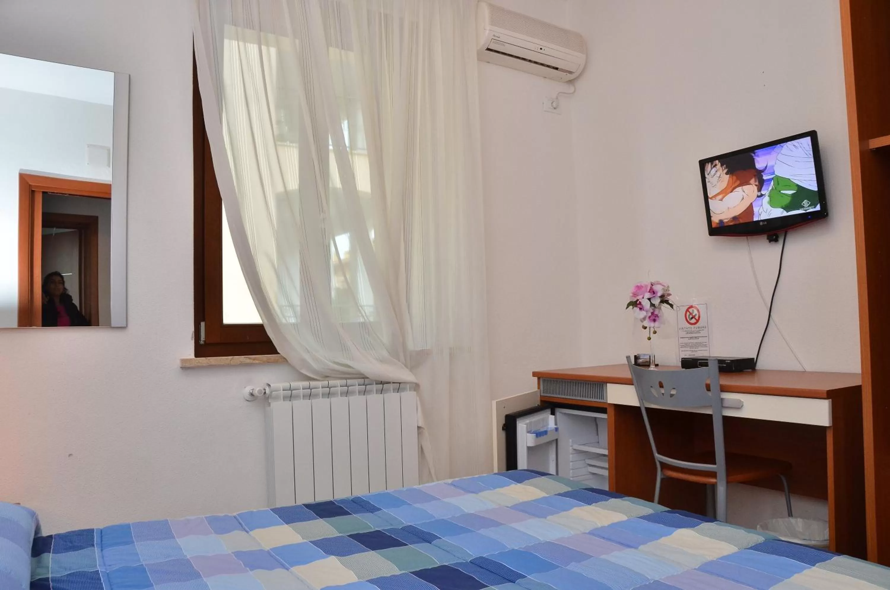 TV/Entertainment Center in Domo - Guest-House Il Nespolo Fiorito