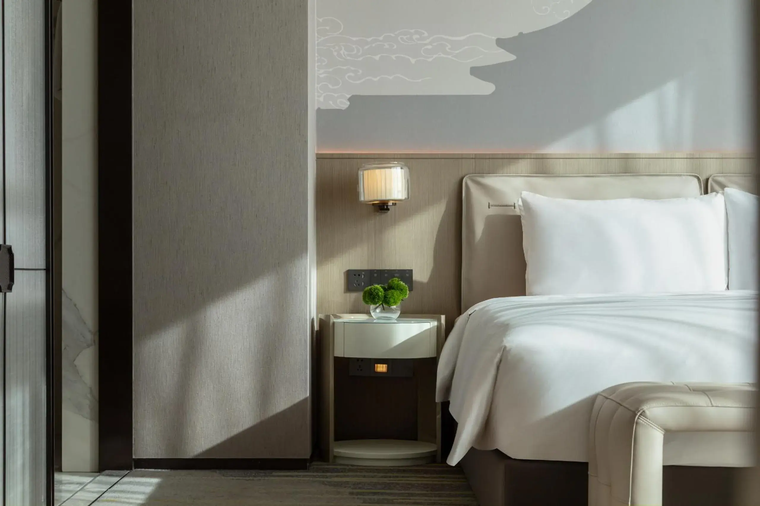 Bed in Grand Metropark Yuantong Hotel