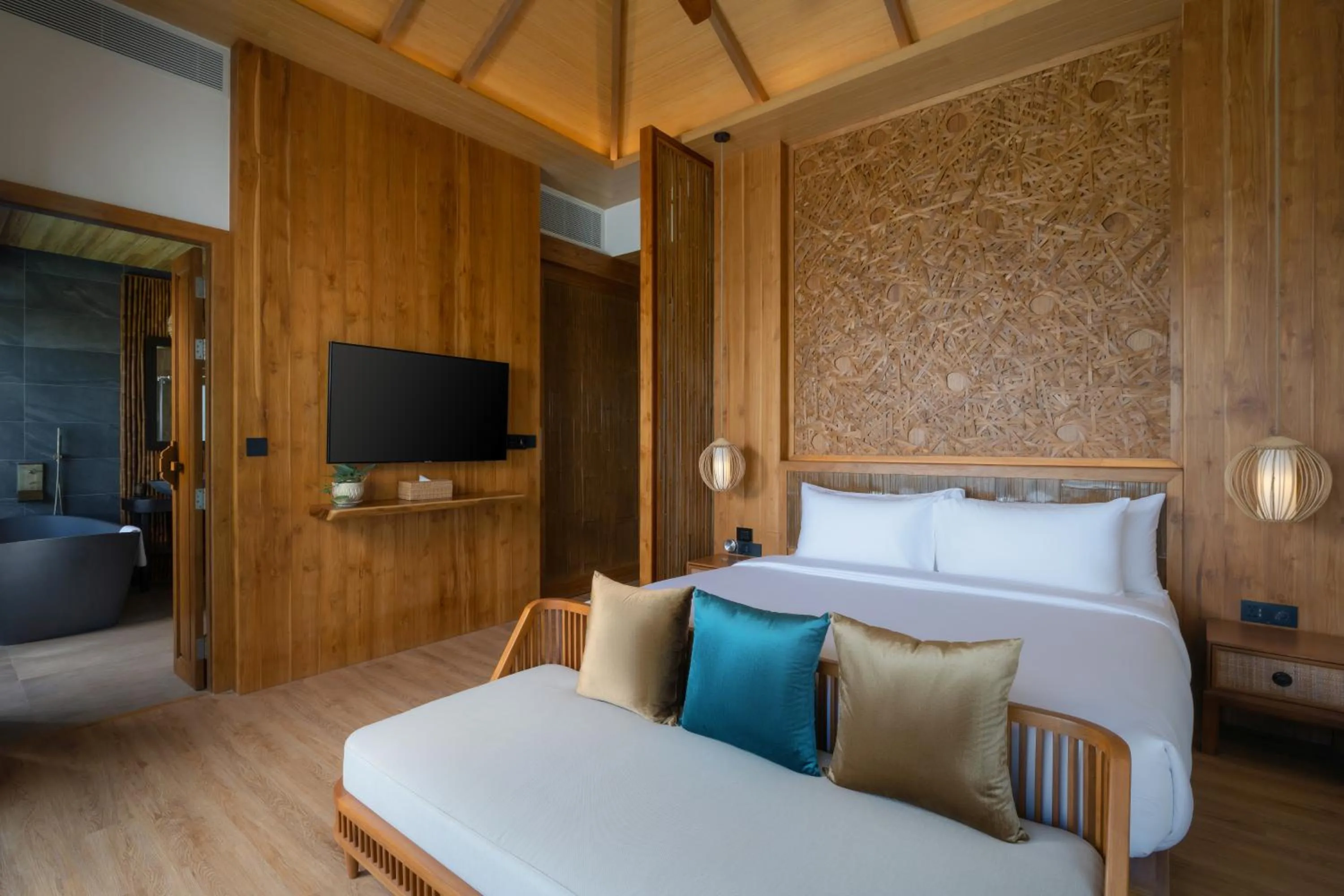 Bed in SINAE Phuket Luxury Hotel