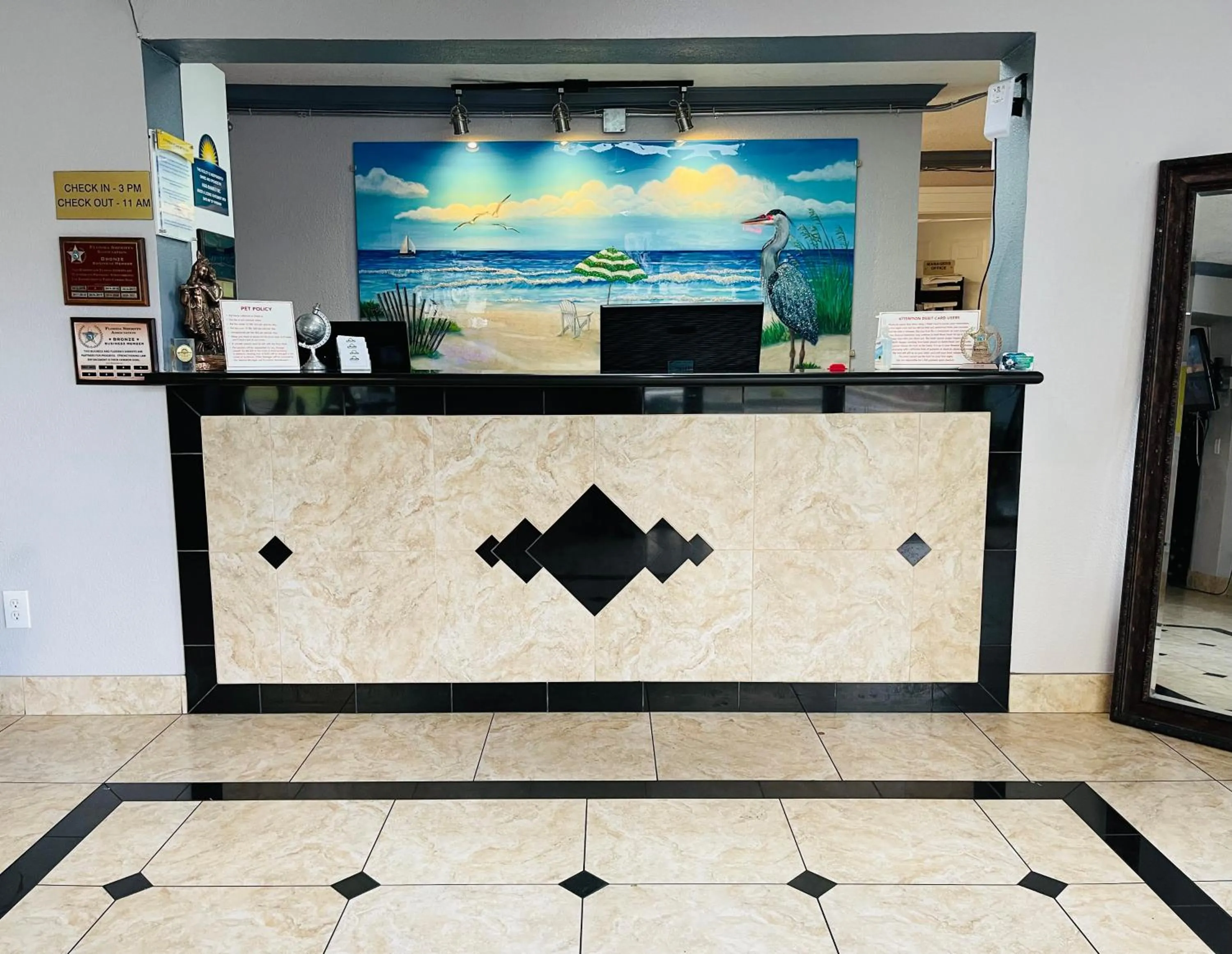 Lobby or reception in Days Inn by Wyndham Fort Walton Beach