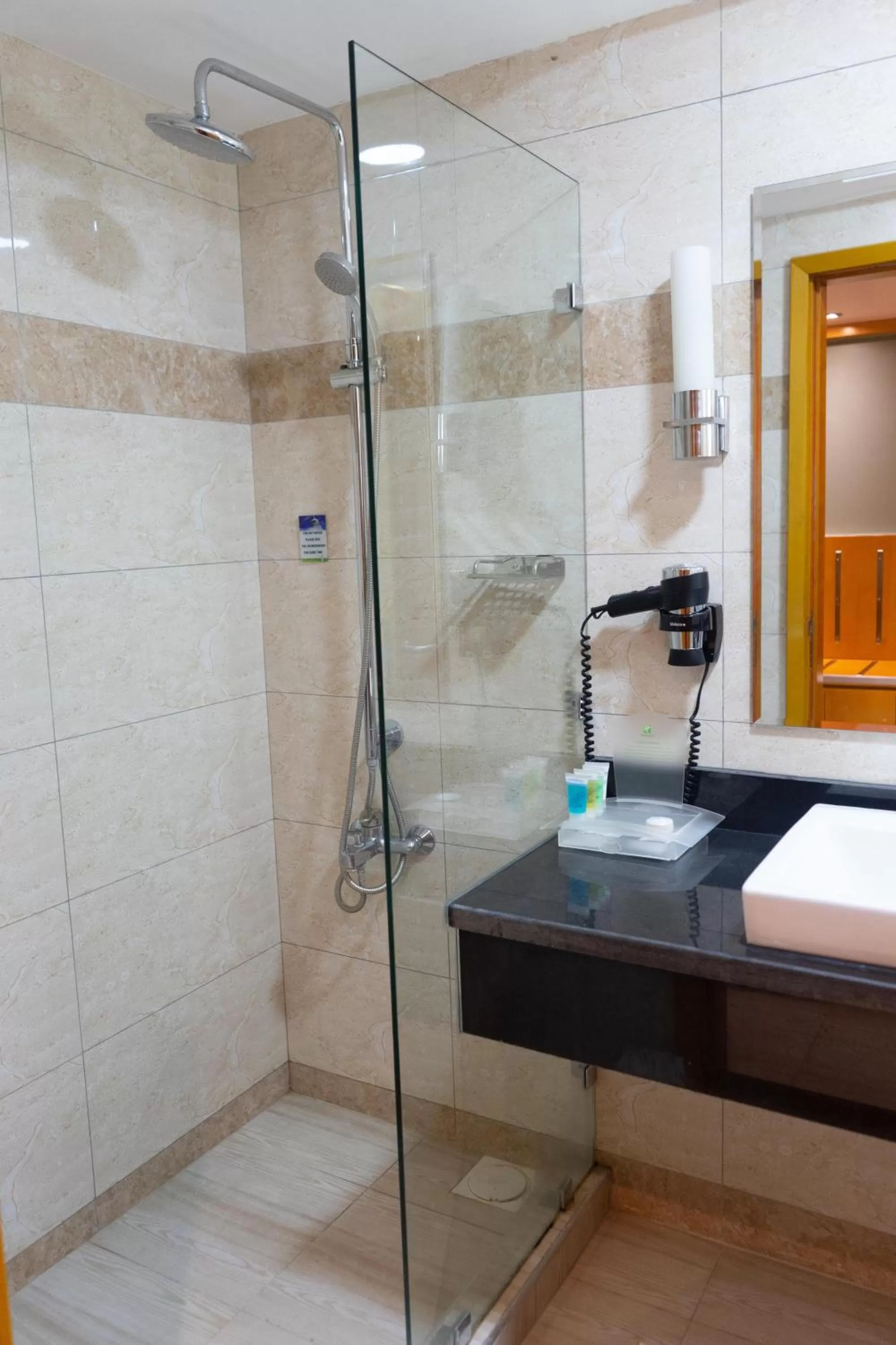 Bathroom in Holiday Inn Dar Es Salaam by IHG