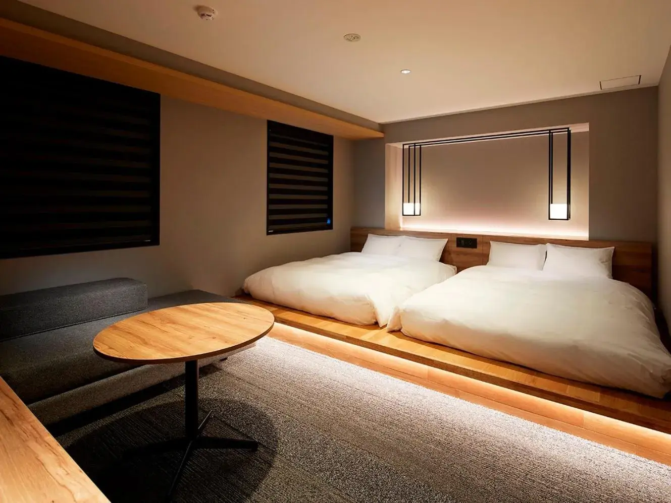 Bed in hotel androoms Shin-Osaka Bed in hotel androoms Shin-Osaka