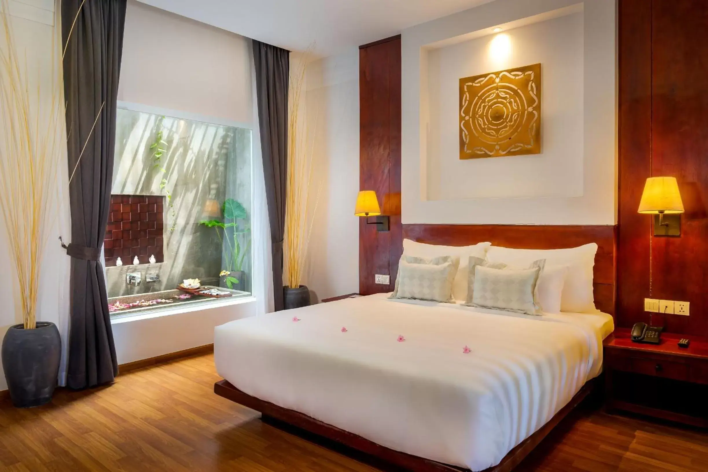 Bed in Sabara Angkor Resort & Spa