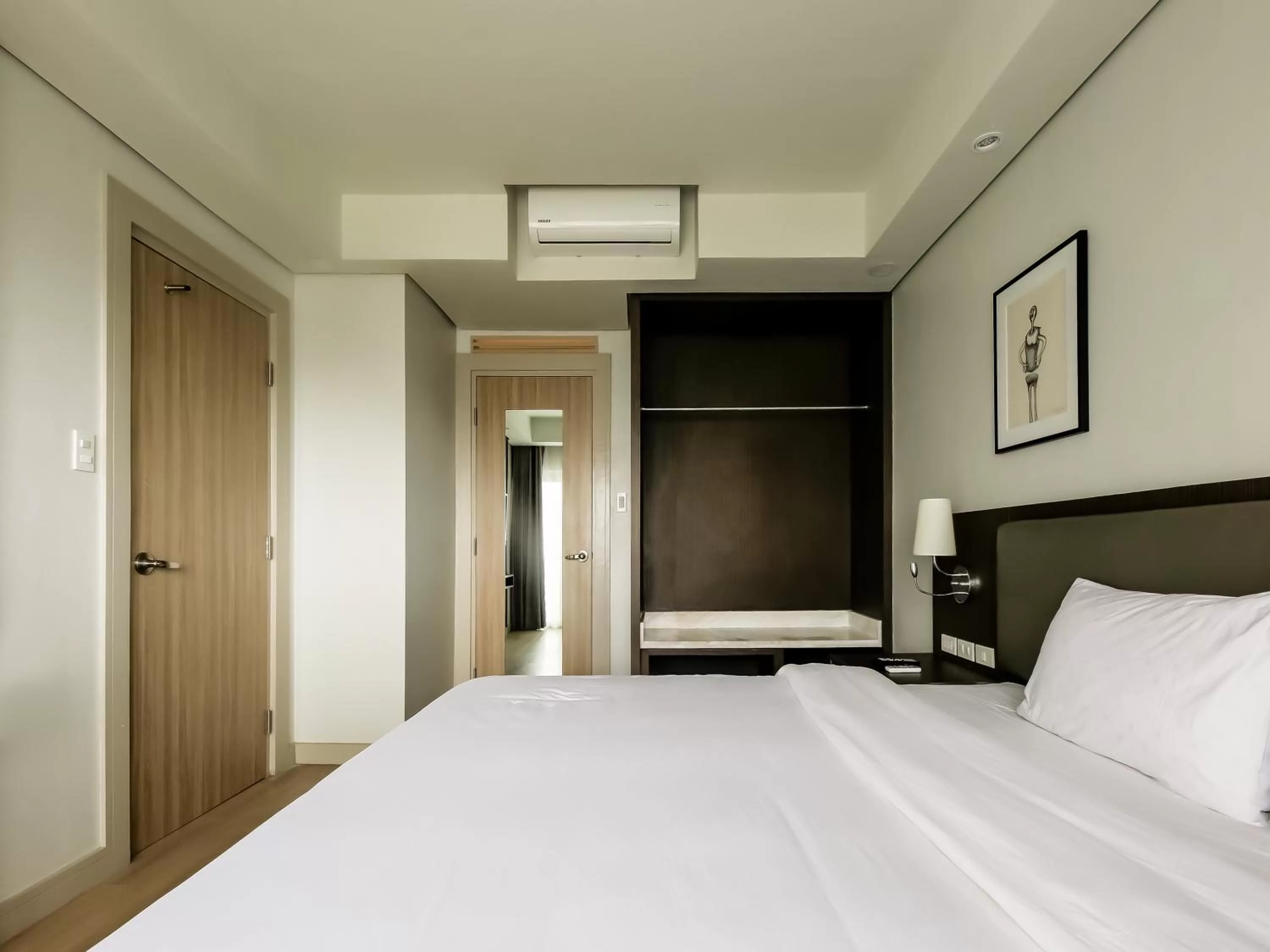Bedroom, Bed in Capital O 804 The Residences at Bonifacio Civic Center