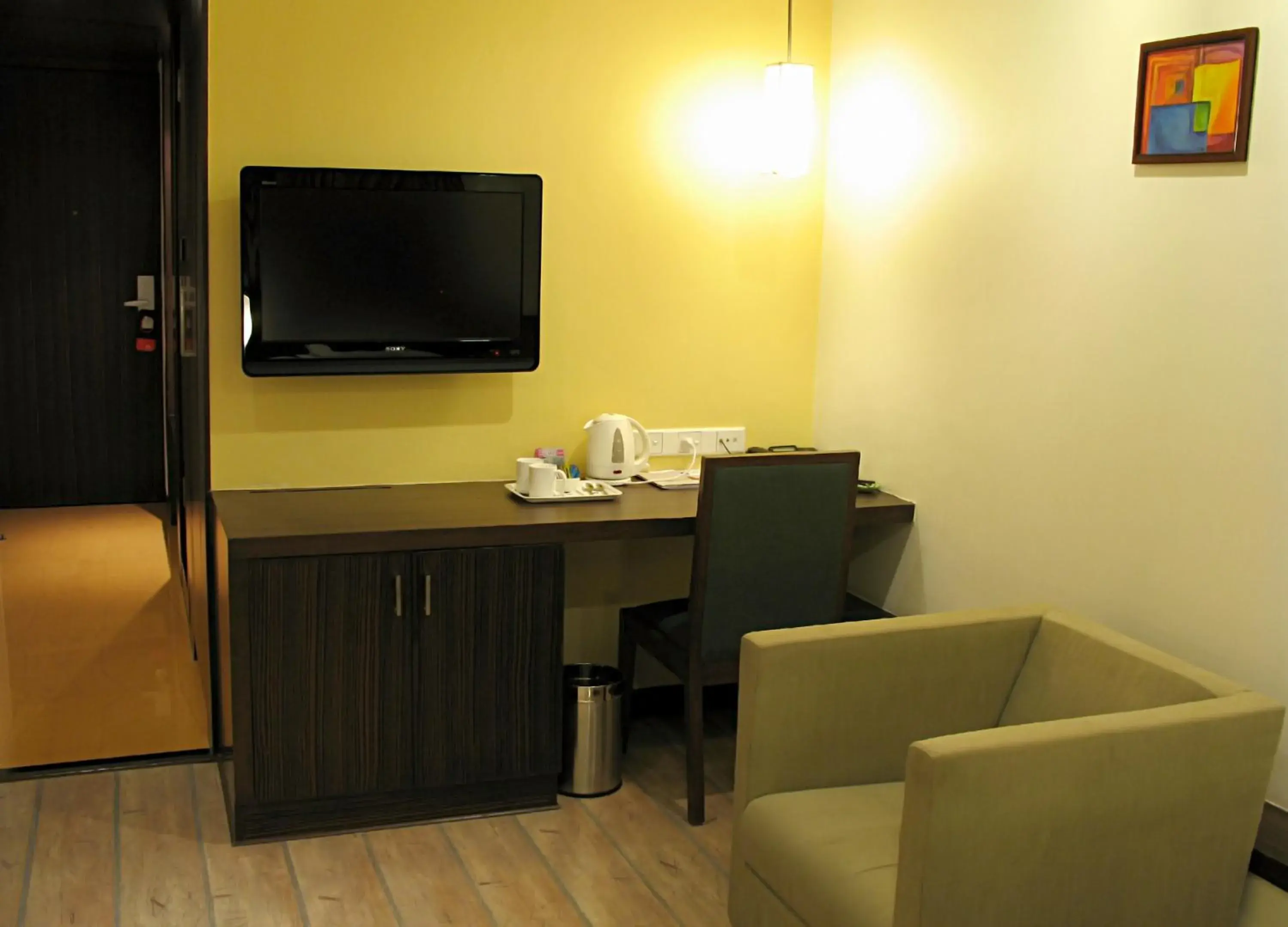 Seating area, TV/Entertainment Center in Hotel Studio Estique