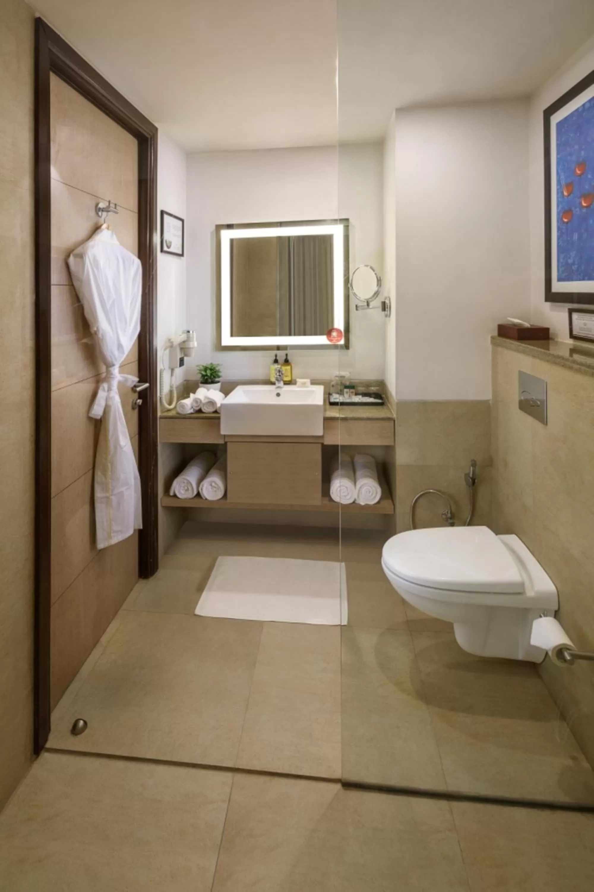 Toilet in Sandal Suites by Lemon Tree Hotels