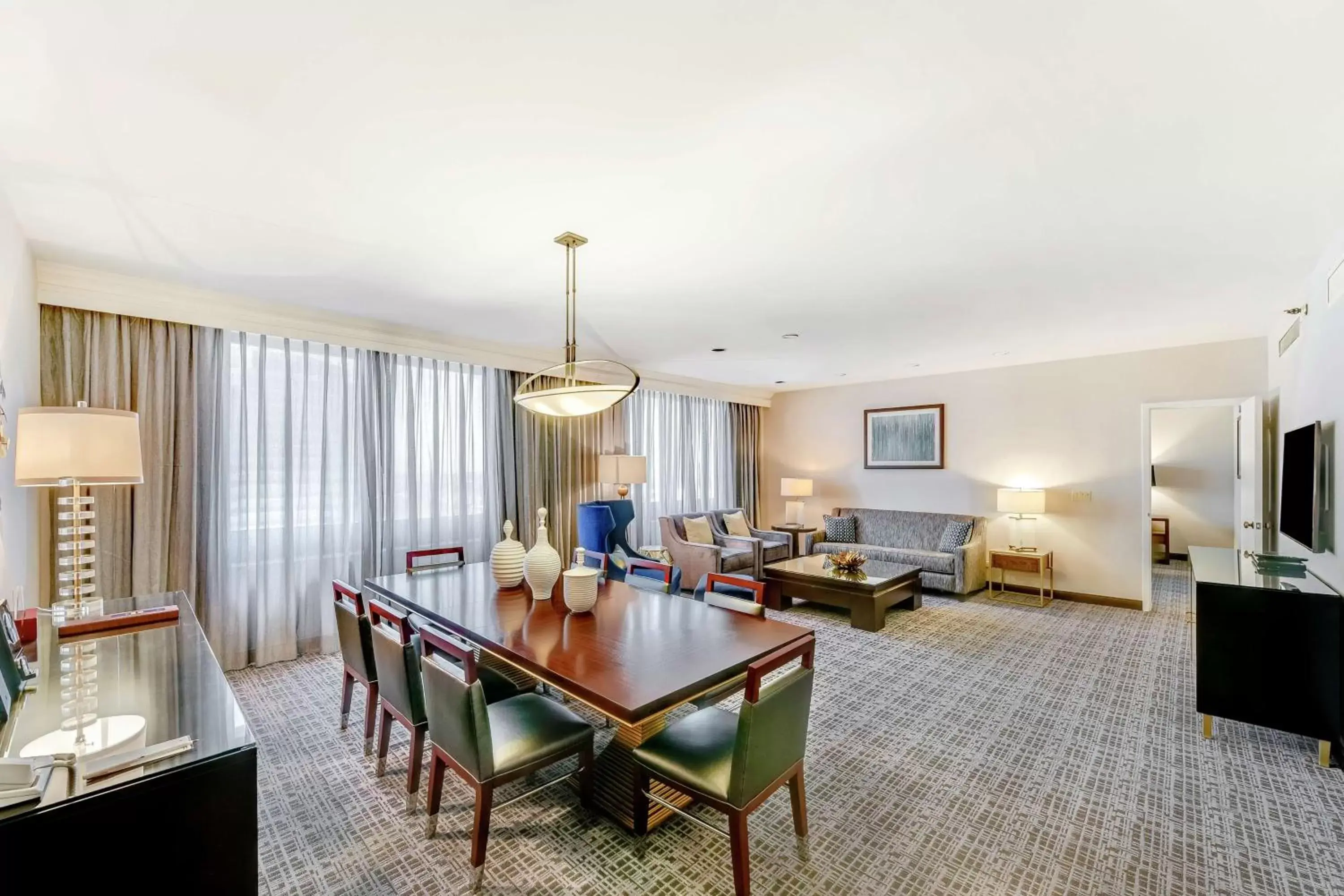 Bedroom, Dining Area in Hotel Fera Anaheim, a DoubleTree by Hilton Hotel