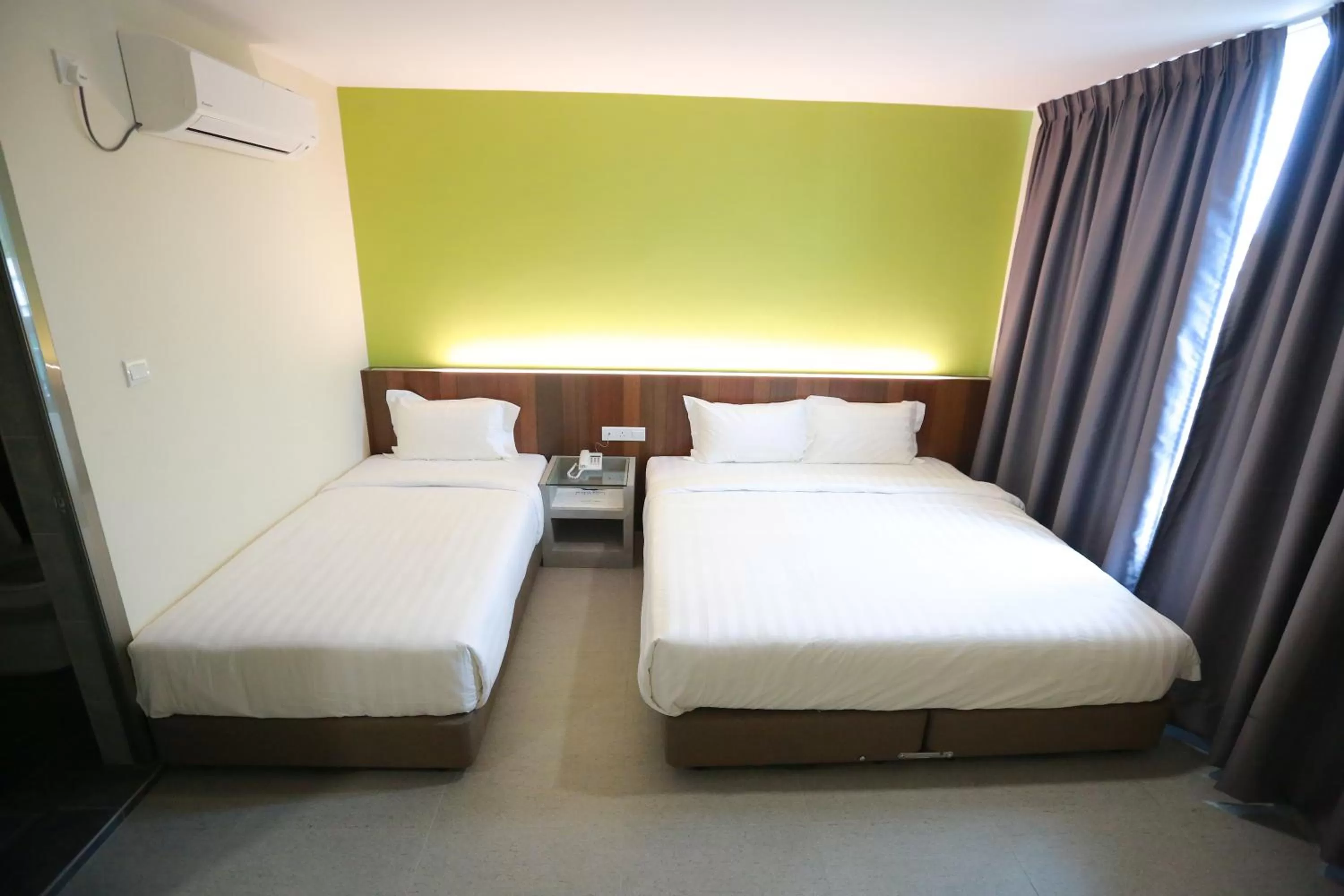 Bed in Pantai Regal Boutique Hotel
