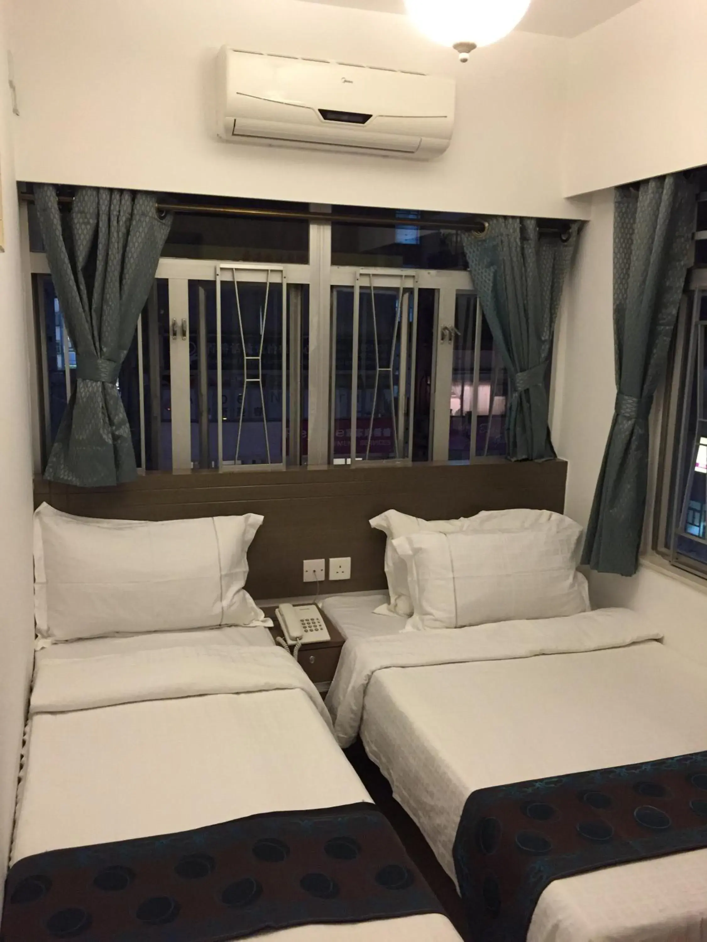 Triple Room in Seasons Hotel – Causeway Bay
