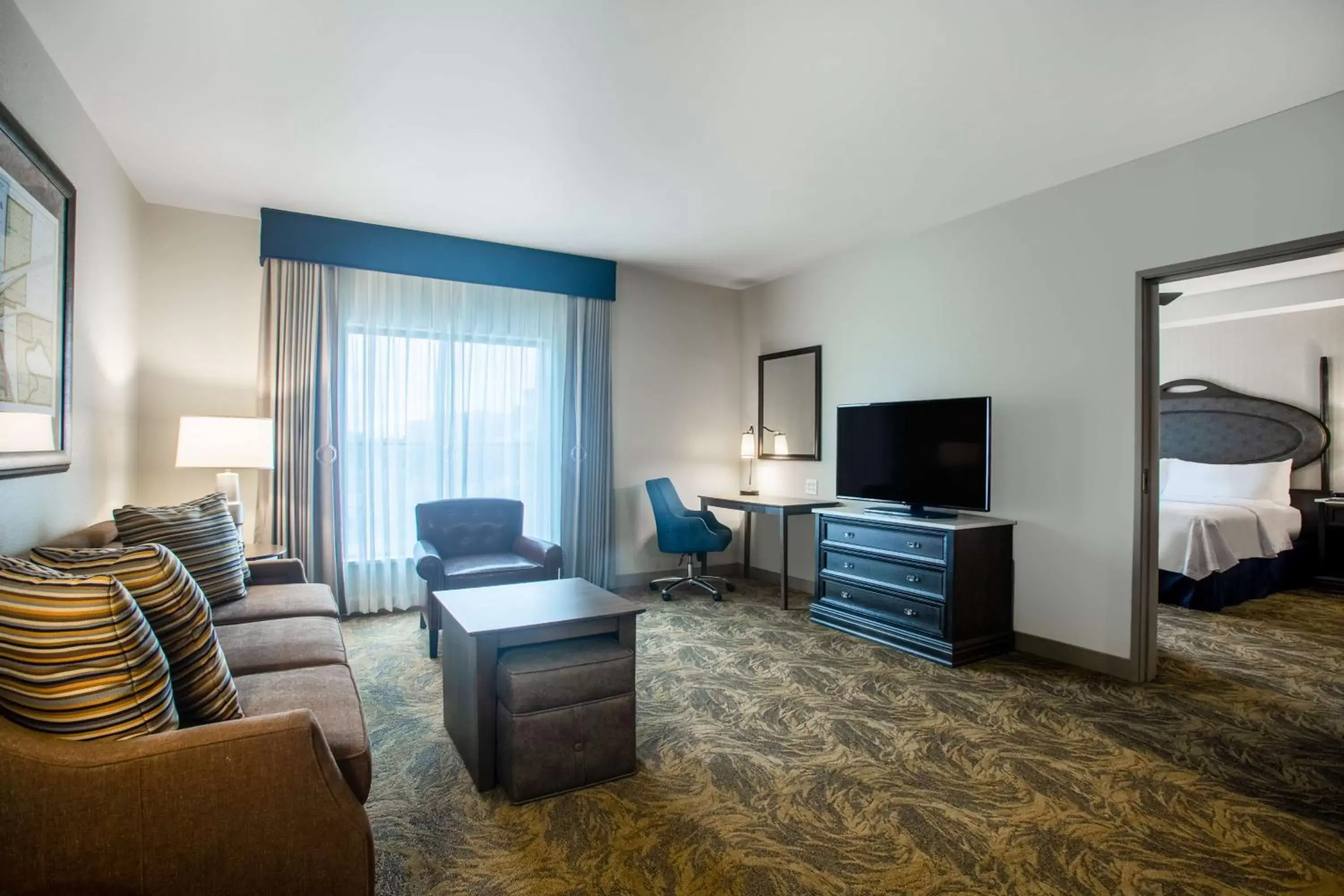 Bedroom, Seating Area in Homewood Suites By Hilton Salina/Downtown, Ks