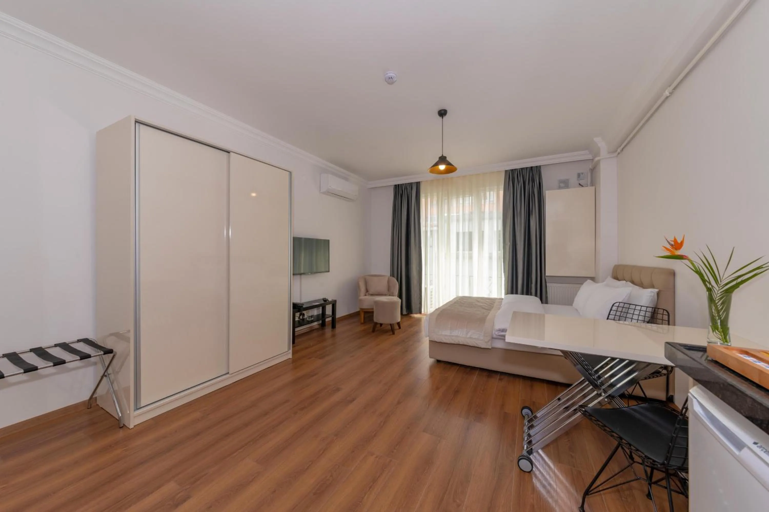 Photo of the whole room, Bed in Joy Suites