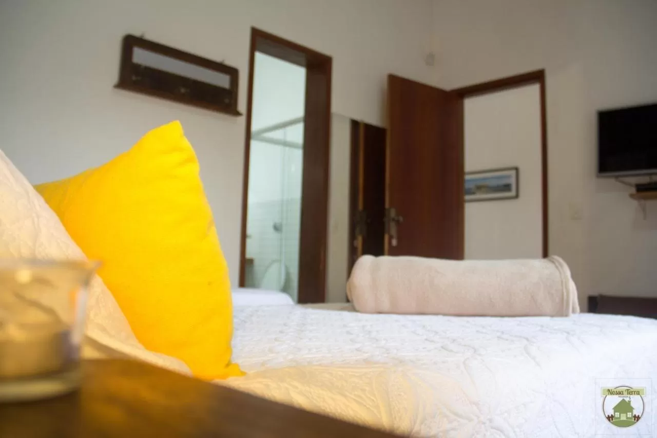 Bed in Pousada Nossa Terra